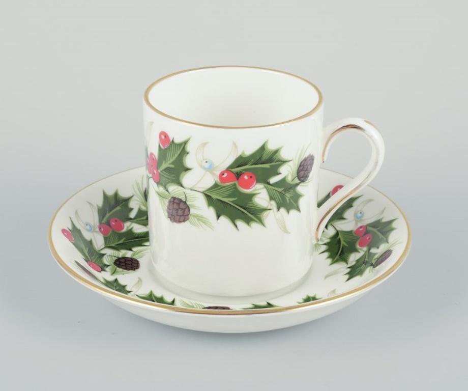 Royal Tuscan, England. Three pairs of cups with handles. 
All cups and saucers are in different sizes.
From the “Noel” series.
20th century.
Perfect condition.
Marked.
Cups: Height 6,3 - 6,6 cm. x Diameter 5.7 - 6.0 cm. without handle 
Saucers: