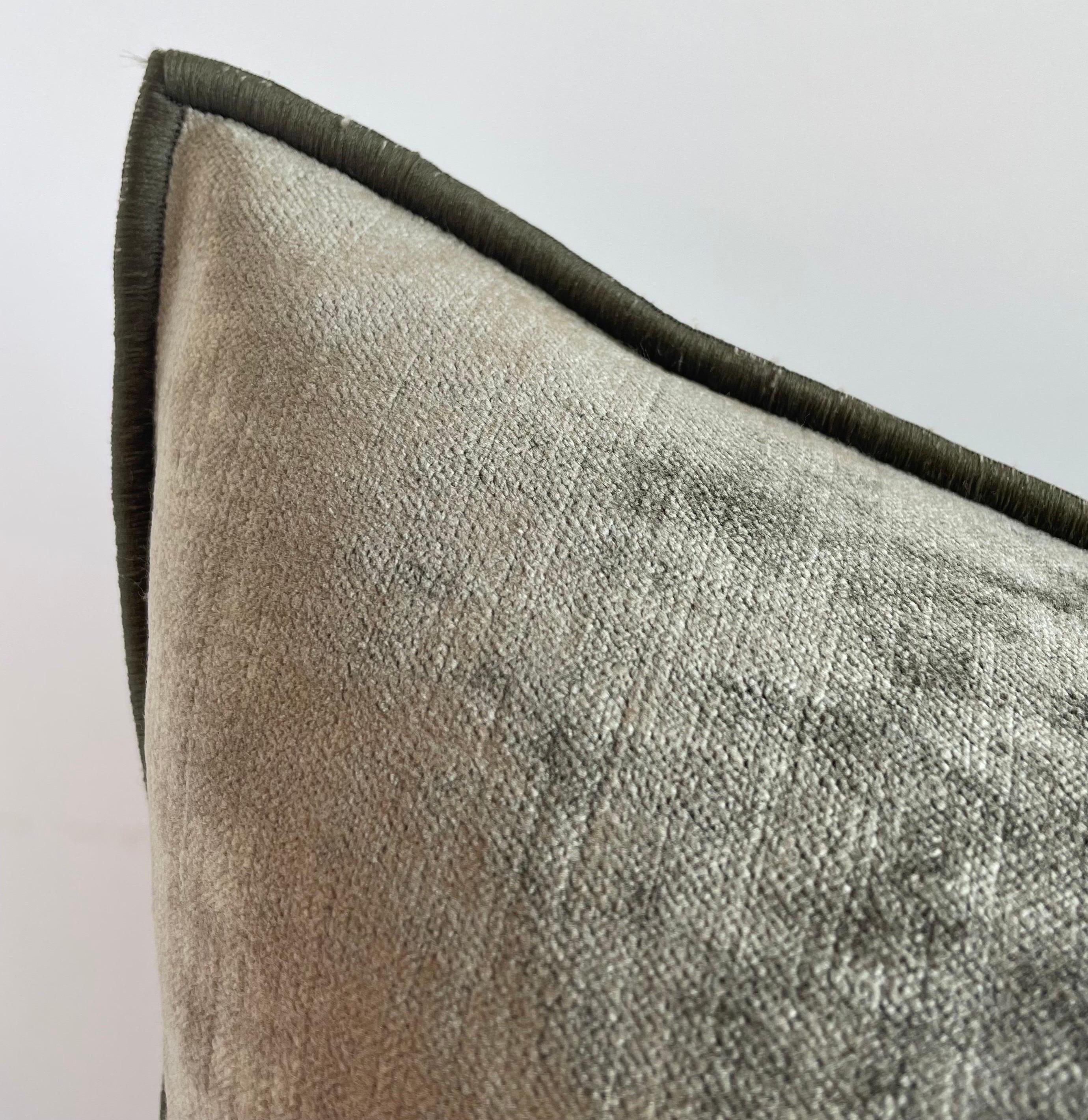 Royal velvet pillow by Maison de Vacance. 
Vintage style velvet lumbar with binded edge. 
Metal zipper closure, and leather pull. If this item is backordered, please allow 4-6 weeks for production.
Size: 12” x 20” 
Color: Kaki
A gray green