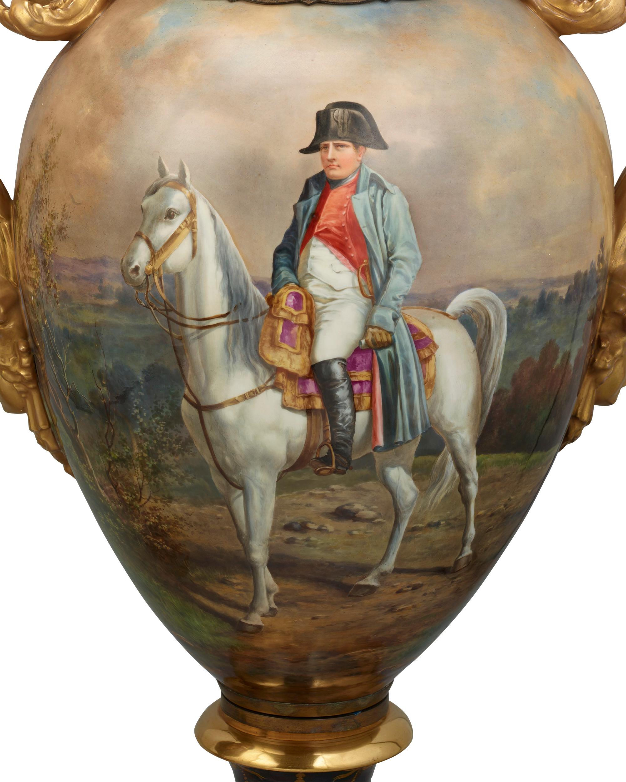 This beautiful and monumental pair of Royal Vienna urns feature richly colored hand painted scenes commemorating several of Napoléon's victories. Each side of the vessels depicts a different, highly detailed Napoleonic scene, including the Battles