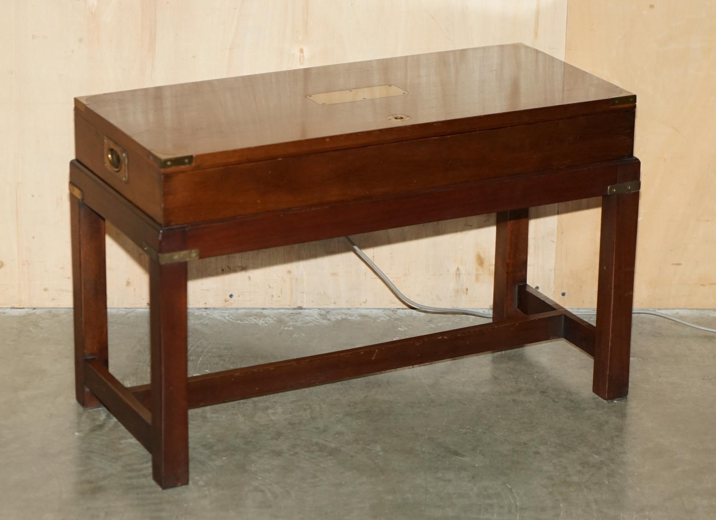 Royal House Antiques

Royal House Antiques is delighted to offer for sale this exceptionally well made, Dynatron HFC 65 Stereophonic Reproducer Record player in fully working condition framed inside a 1950's Mahogany 
Brass Campaign side table