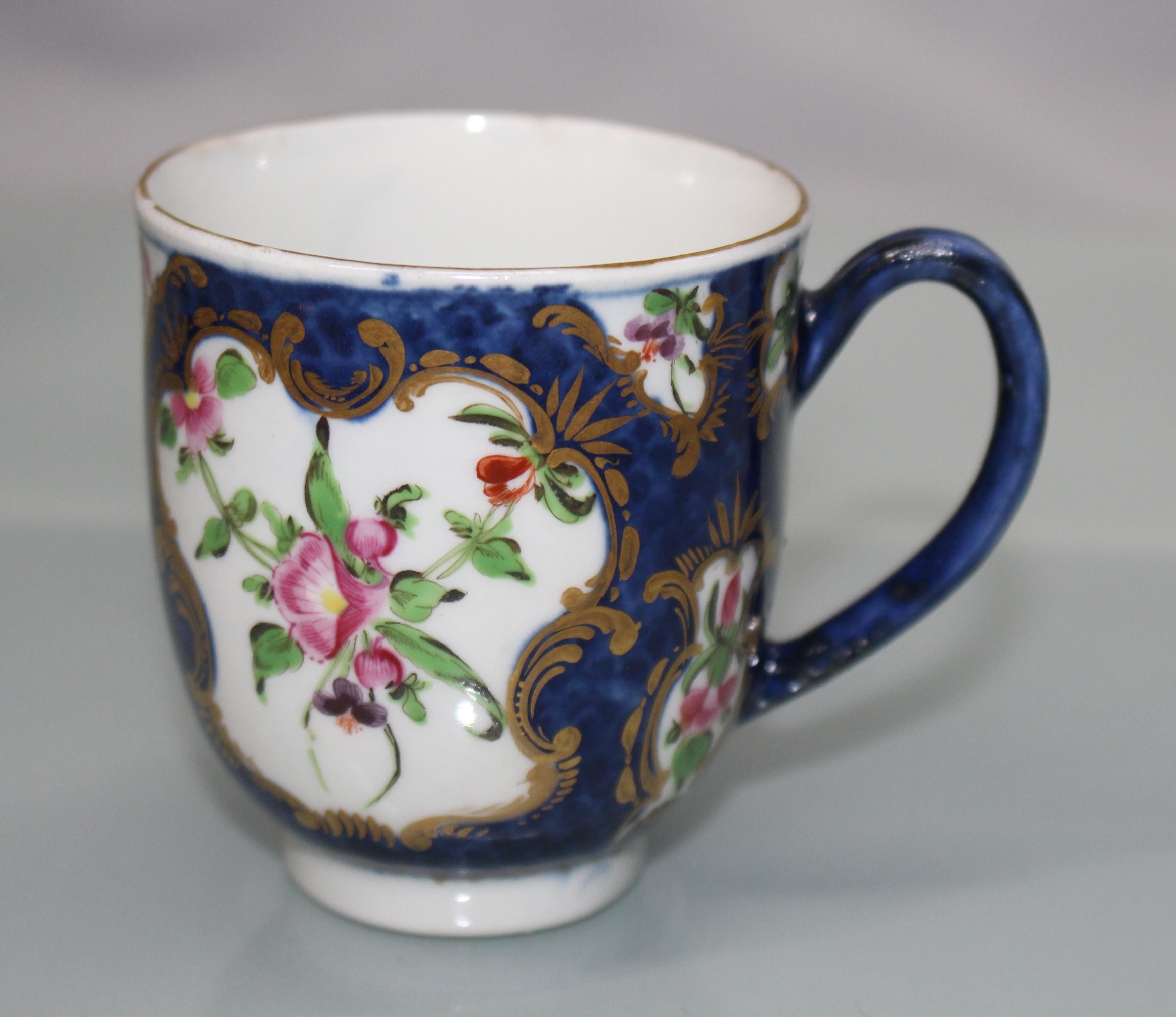 Manufacturer 
Royal Worcester

Period 
18th century, circa 1770

Pattern
Blue scale

Saucer diameter 
12 cm / 4 3/4 in

Cup height 
6.5 cm / 2 1/2 in

Bowl height 
4 cm / 1 1/2 in

Decoration 
Painted floral panels with gilt