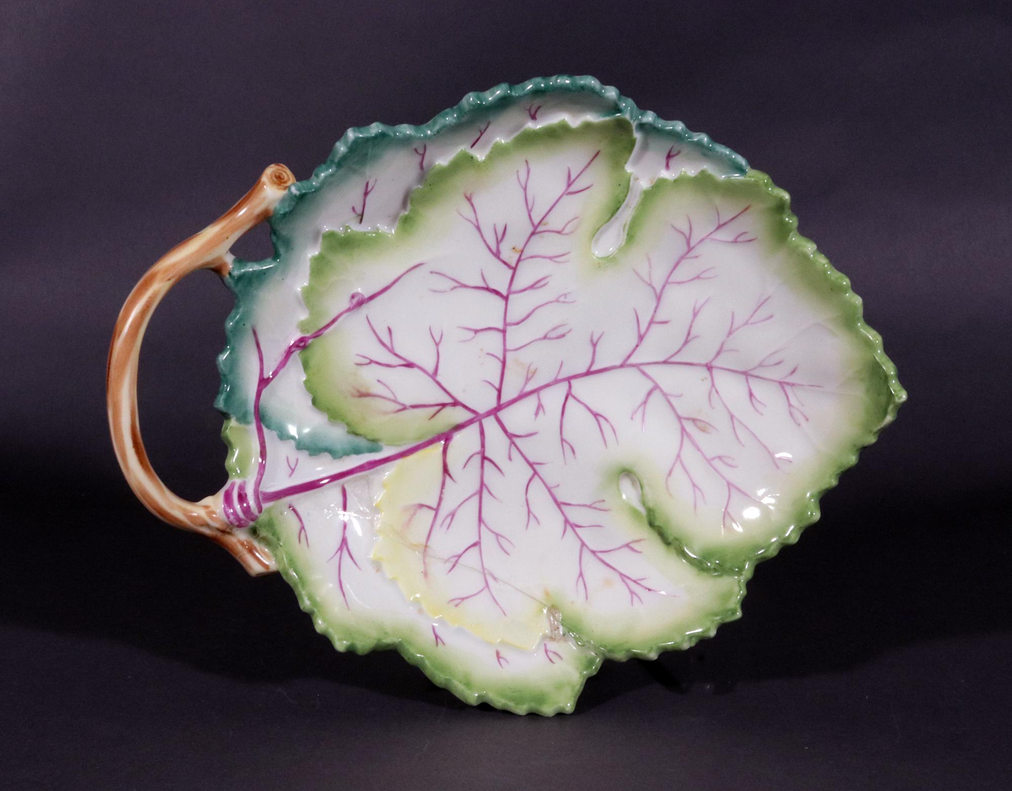 Royal Worcester Porcelain Trompe L'oeil Leaf-shaped Dishes,
Bone China, 
Pattern 3628,
Set of Five,
Circa 1958

The set of five Royal Worcester Bone China trompe l'oeil Leaf-shaped dishes are naturalistically modeled in the form of two large