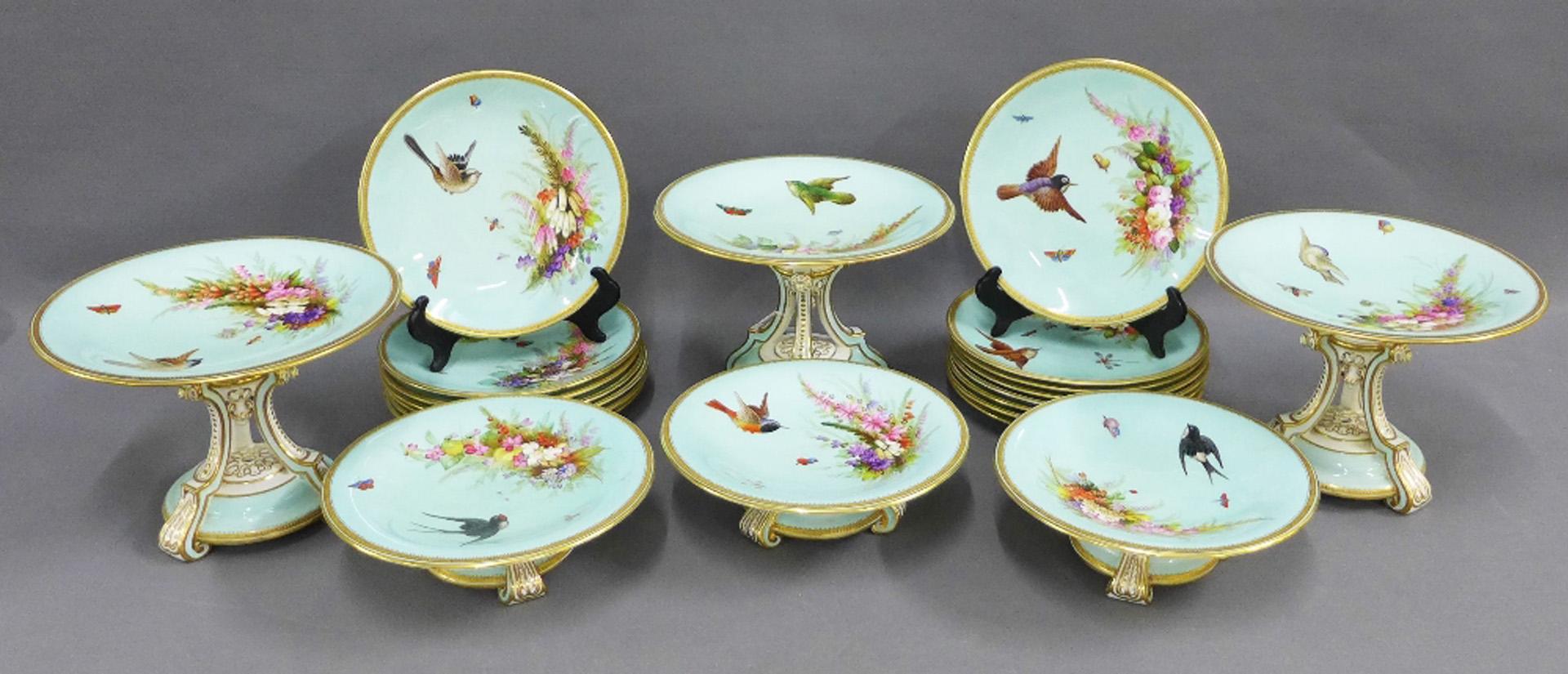 An impressive and stunning Royal Worcester dessert service. All handpainted  in the manner of John Hopewell & George Hundley and raised enamelled with a feast of garden flowers, flying birds, butterflies and ladybirds. The paintings are set on a