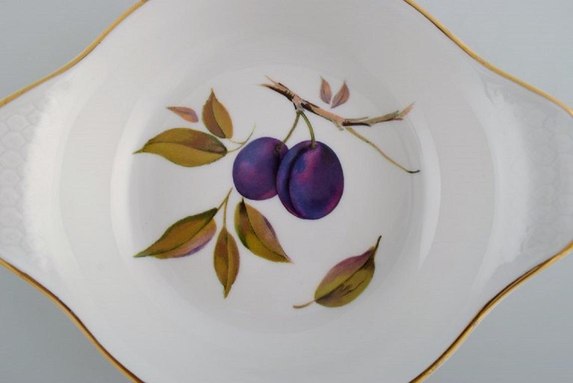 English Royal Worcester, England. A pair of Evesham porcelain serving bowls. 1960s/70s