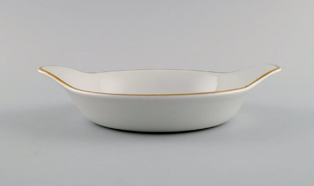 Mid-20th Century Royal Worcester, England. A pair of Evesham porcelain serving bowls. 1960s/70s