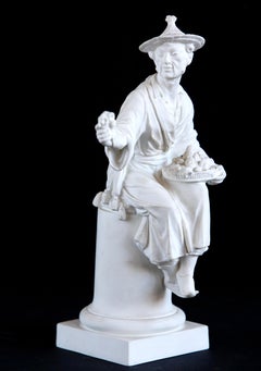 Figurine « Le Panier » de Royal Worcester, Angleterre, en porcelaine d'os