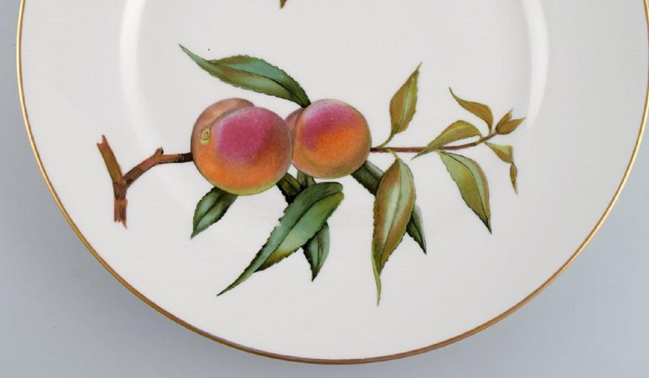 English Royal Worcester, England. Eight Evesham Dinner Plates in Porcelain