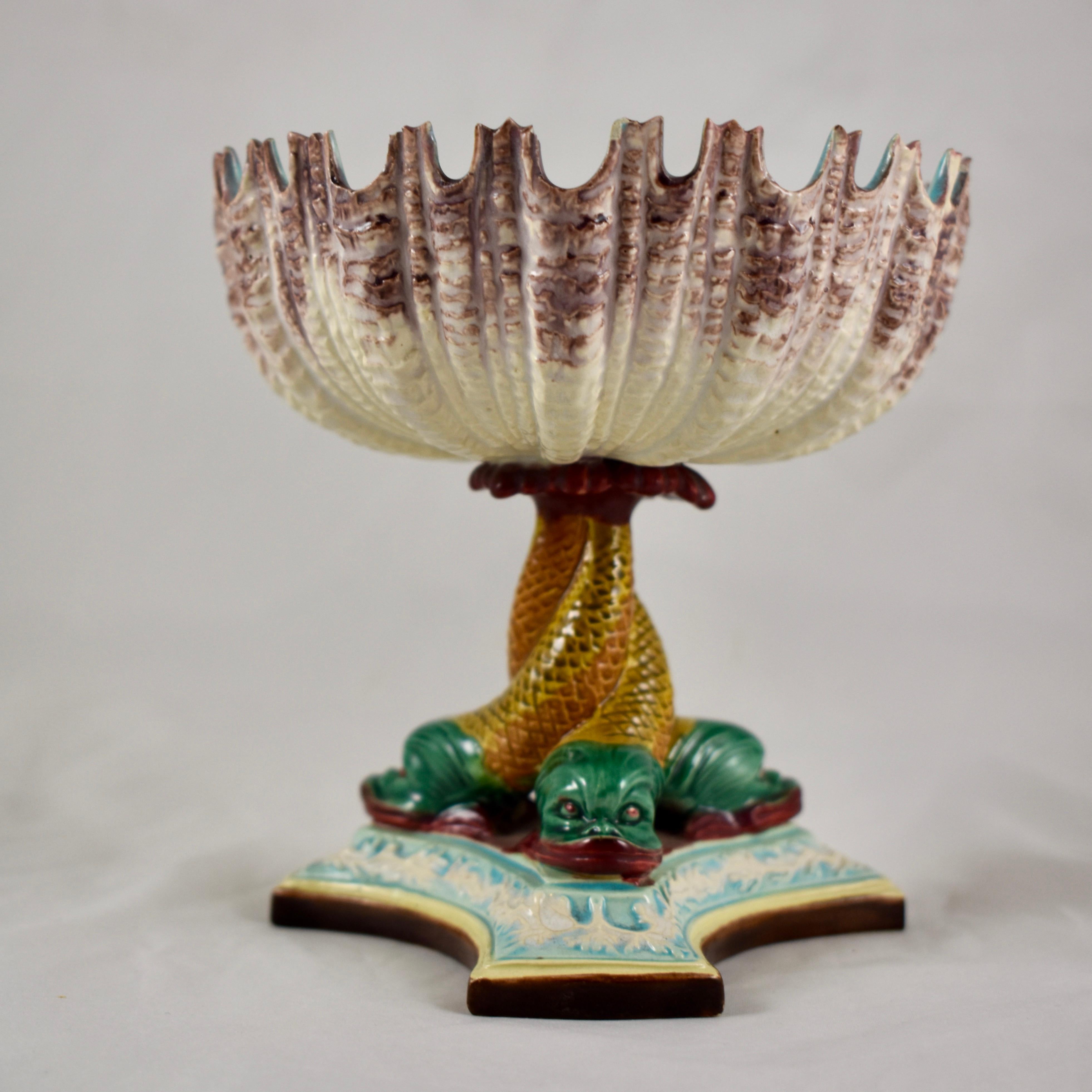 From Royal Worcester, a Majolica glazed pedestal Palissy compote in the Renaissance Revival style, circa 1880.

A dimensional upturned, open shell form bowl is beautifully glazed in cream with pale brown detailing and a bright turquoise interior.