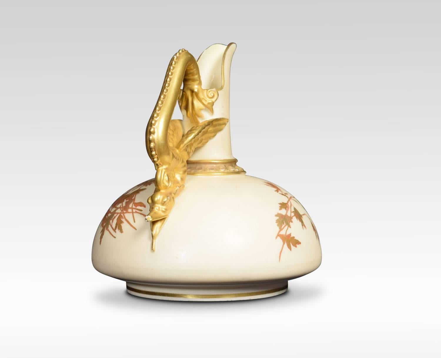 Royal Worcester ewer, with winged dragon handle, painted with flowers and leaves against an ivory ground.
Dimensions:
Height 6 inches
Width 5.5 inches
Depth 6 inches.