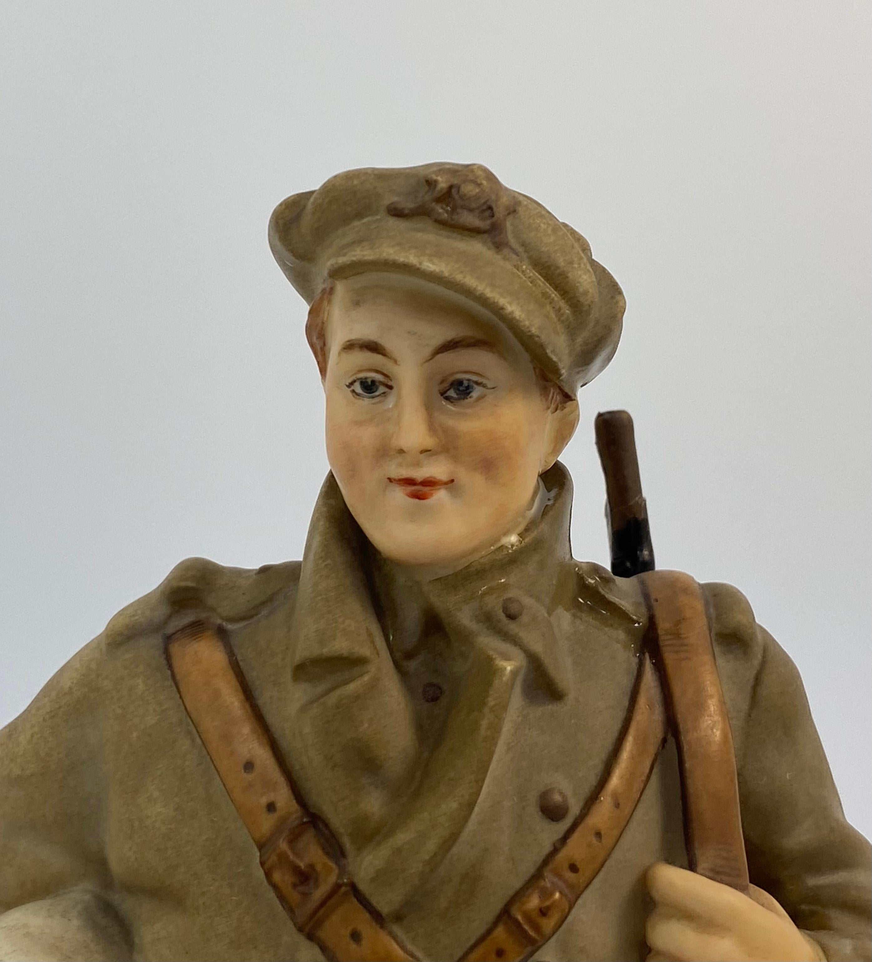 A rare Royal Worcester porcelain figure of a First World War British soldier, modelled by William Pointon, dated 1916. The ‘Tommy’, modelled standing, carrying his rifle and haversack whilst set upon a grassy mound base.
Puce printed factory mark,