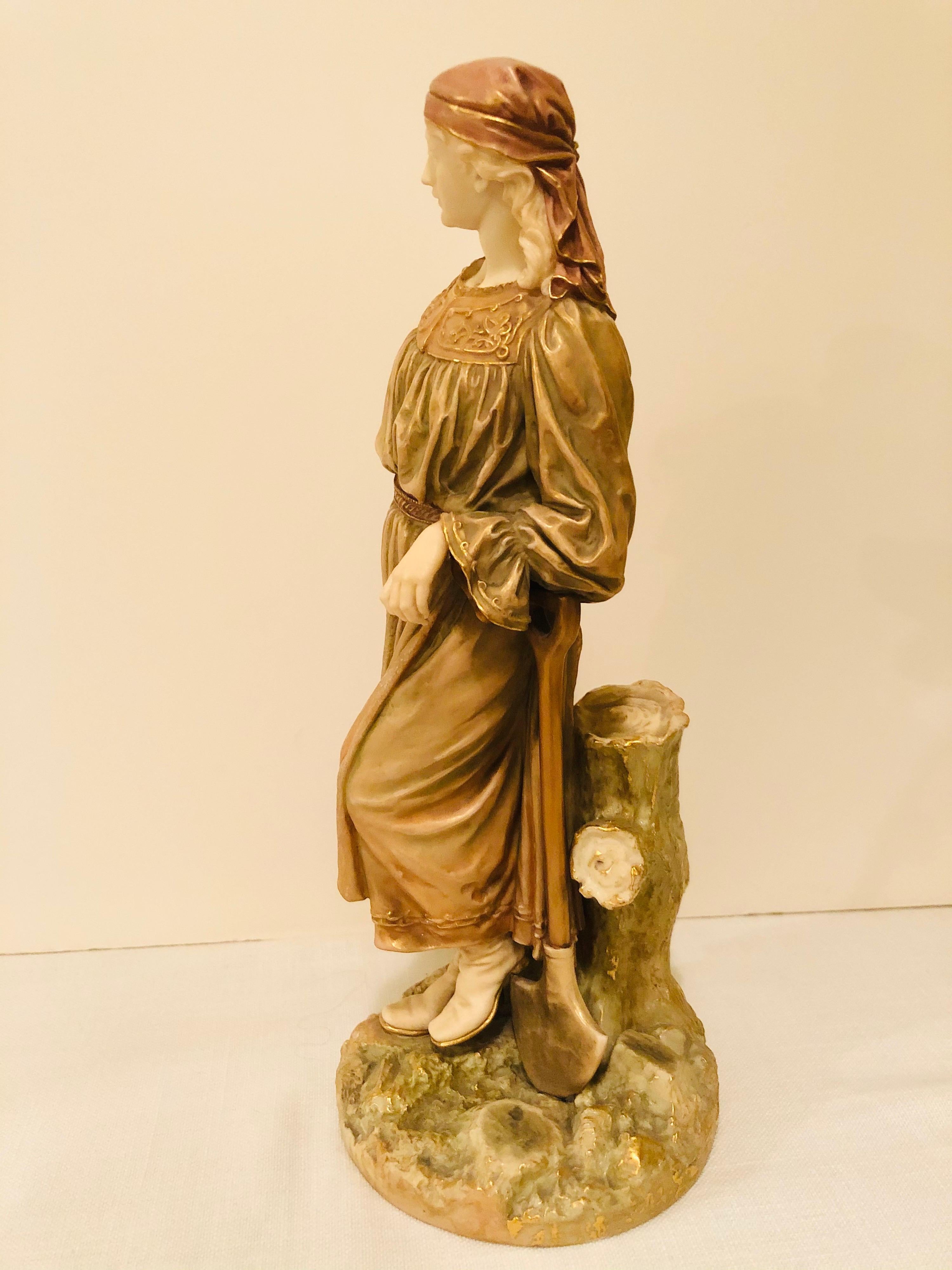 English Royal Worcester Figure of a Lady Gardener Wearing a Flowing Dress and Hat