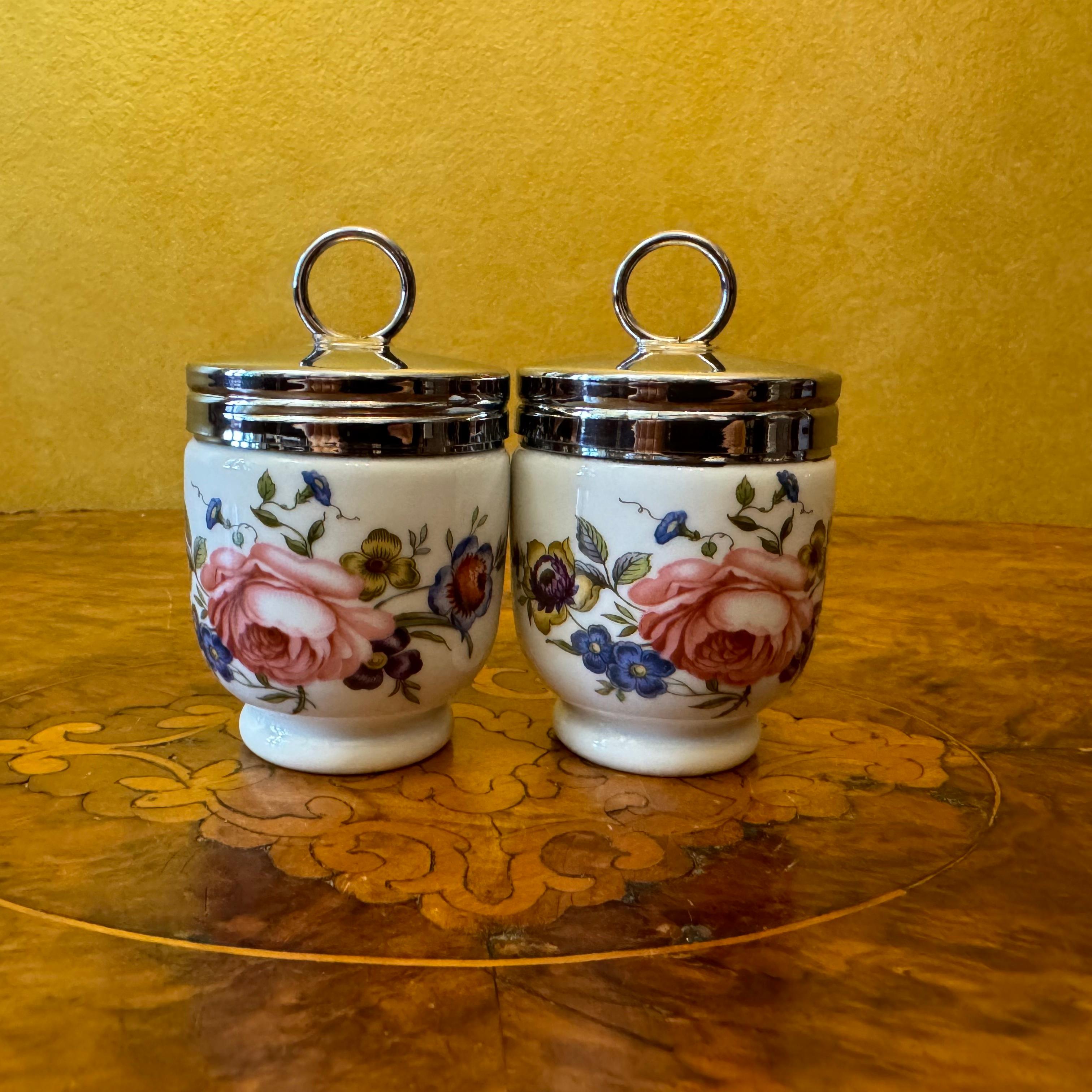 Description: Flower print on both sides, metal lid that screws on, some marks and scratches to metal parts, stamped Royal Worcester

Material: Porcelain 

Country Of Origin: England 

Measurements: 9cm high, 5cm diameter 

All shipping comes with