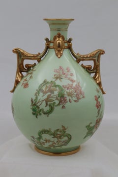 Royal Worcester hand painted and gilded two handled vase