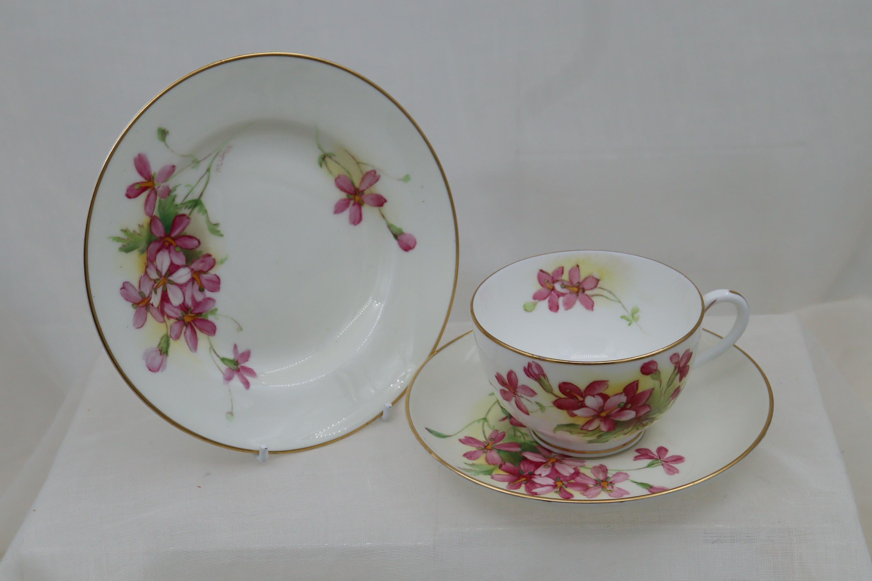 Each piece of this very pretty  Royal Worcester cup, saucer and plate set is decorated with a hand painted spray of flowers, and then finished off with gilding to the edges and the handle of the cup. The three pieces are signed by the artist H