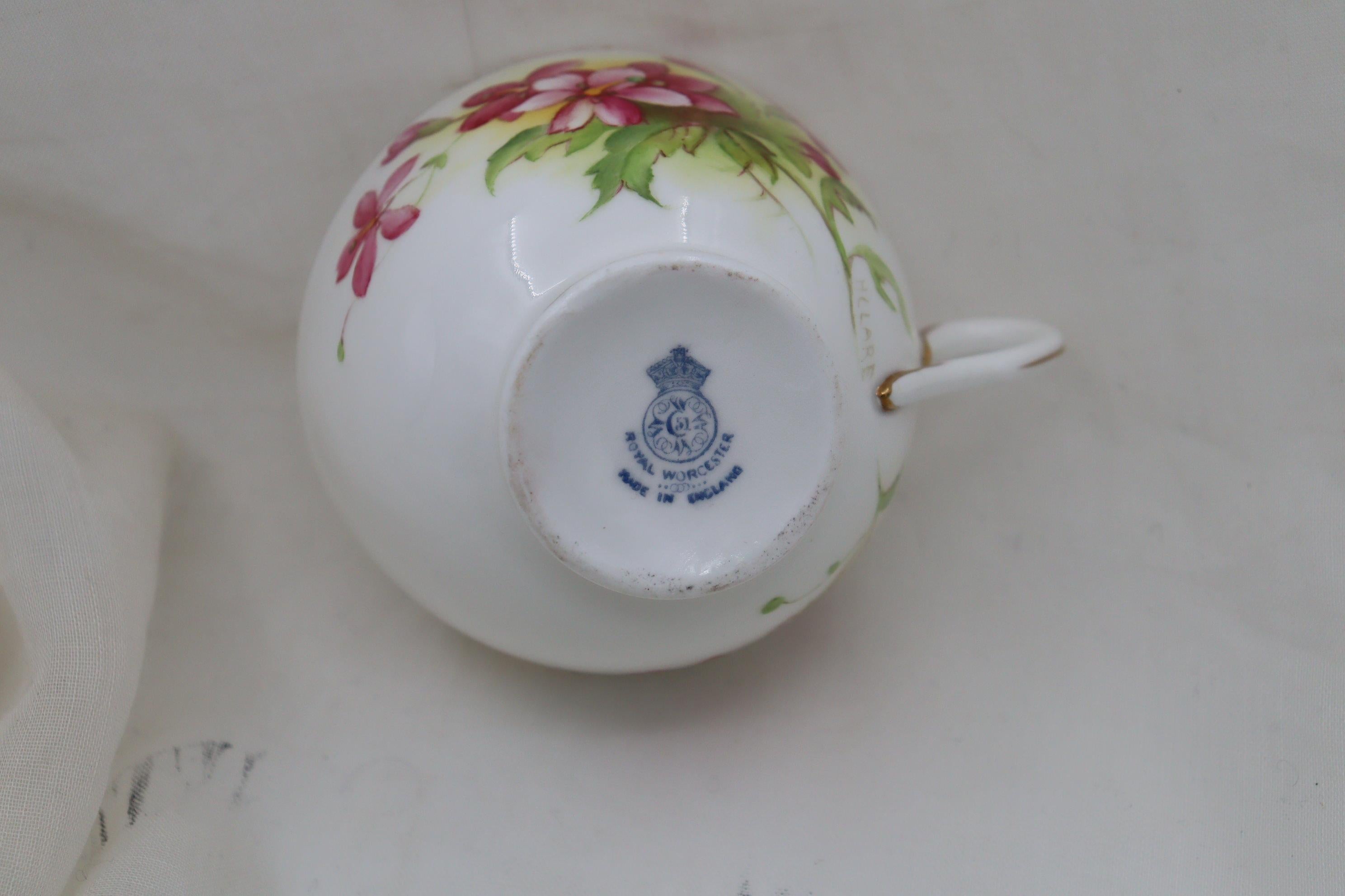 Porcelain Royal Worcester hand painted cup, saucer and plate signed H Clare For Sale