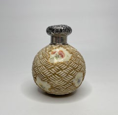 Royal Worcester perfume bottle, Black, Starr & Frost silver mounts, c. 1890.