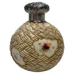 Royal Worcester perfume bottle, Black, Starr & Frost silver mounts, c. 1890.