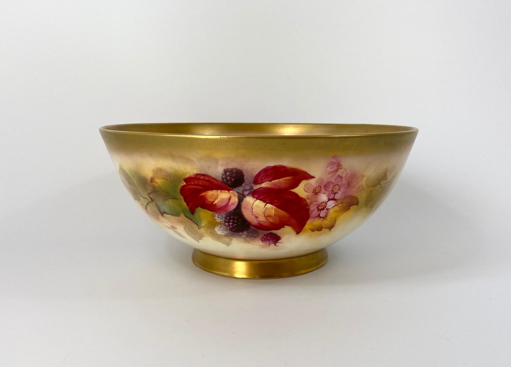 An unusually large Royal Worcester porcelain bowl, dated 1930. Finely painted by Kitty Blake to the interior, with a study of berries and autumnal leaves, within a gilded rim.
The exterior similarly decorated, above the gilded foot rim.
Signed –
