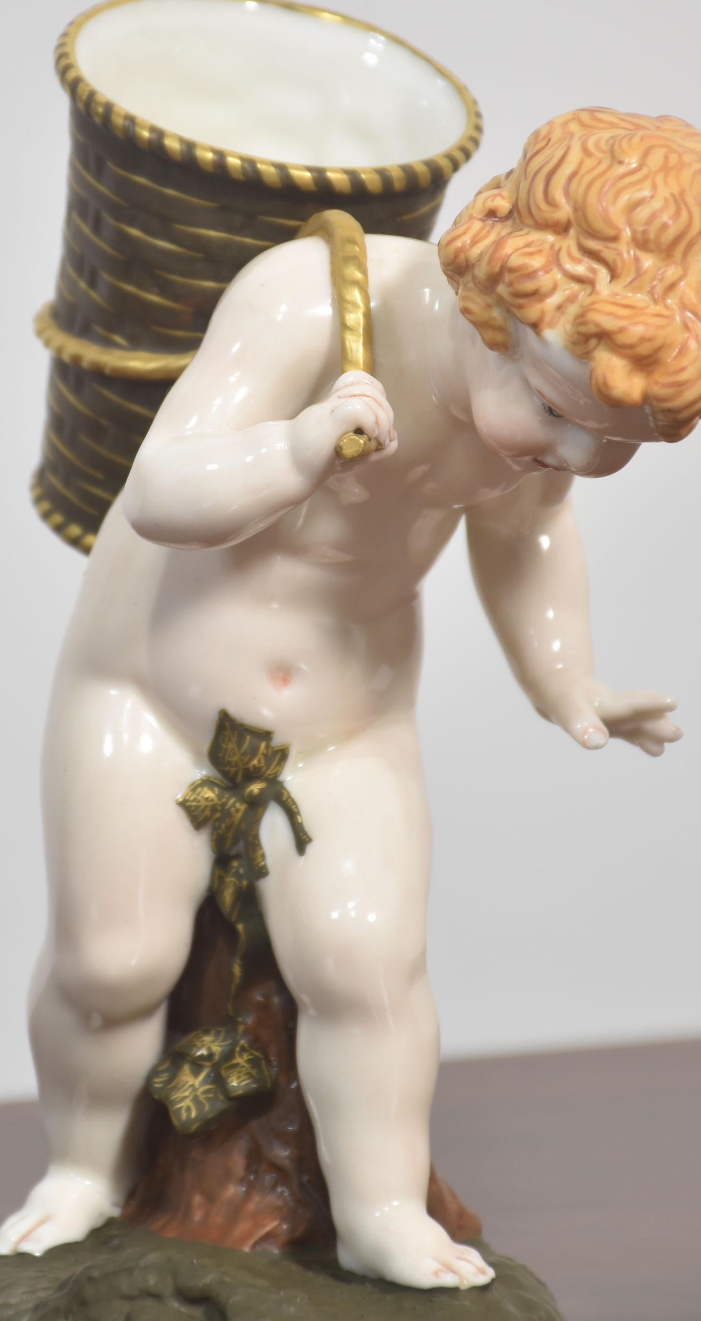 British Royal Worcester Porcelain Figure – Cherub with Basket For Sale