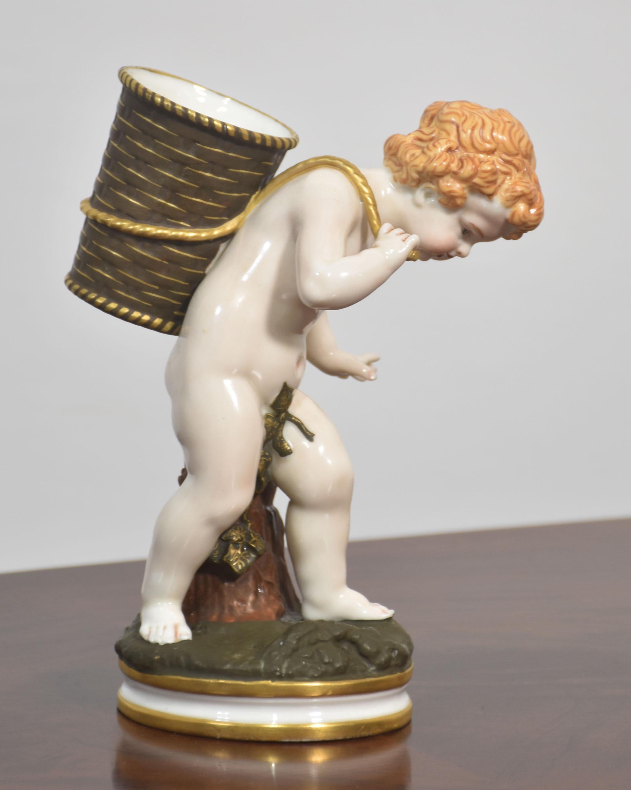 Royal Worcester Porcelain Figure – Cherub with Basket In Good Condition For Sale In Cheshire, GB