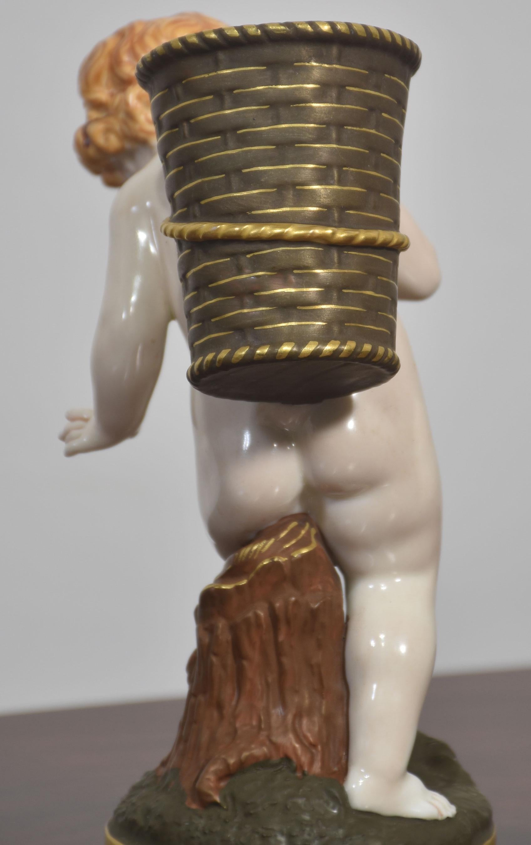 20th Century Royal Worcester Porcelain Figure – Cherub with Basket For Sale