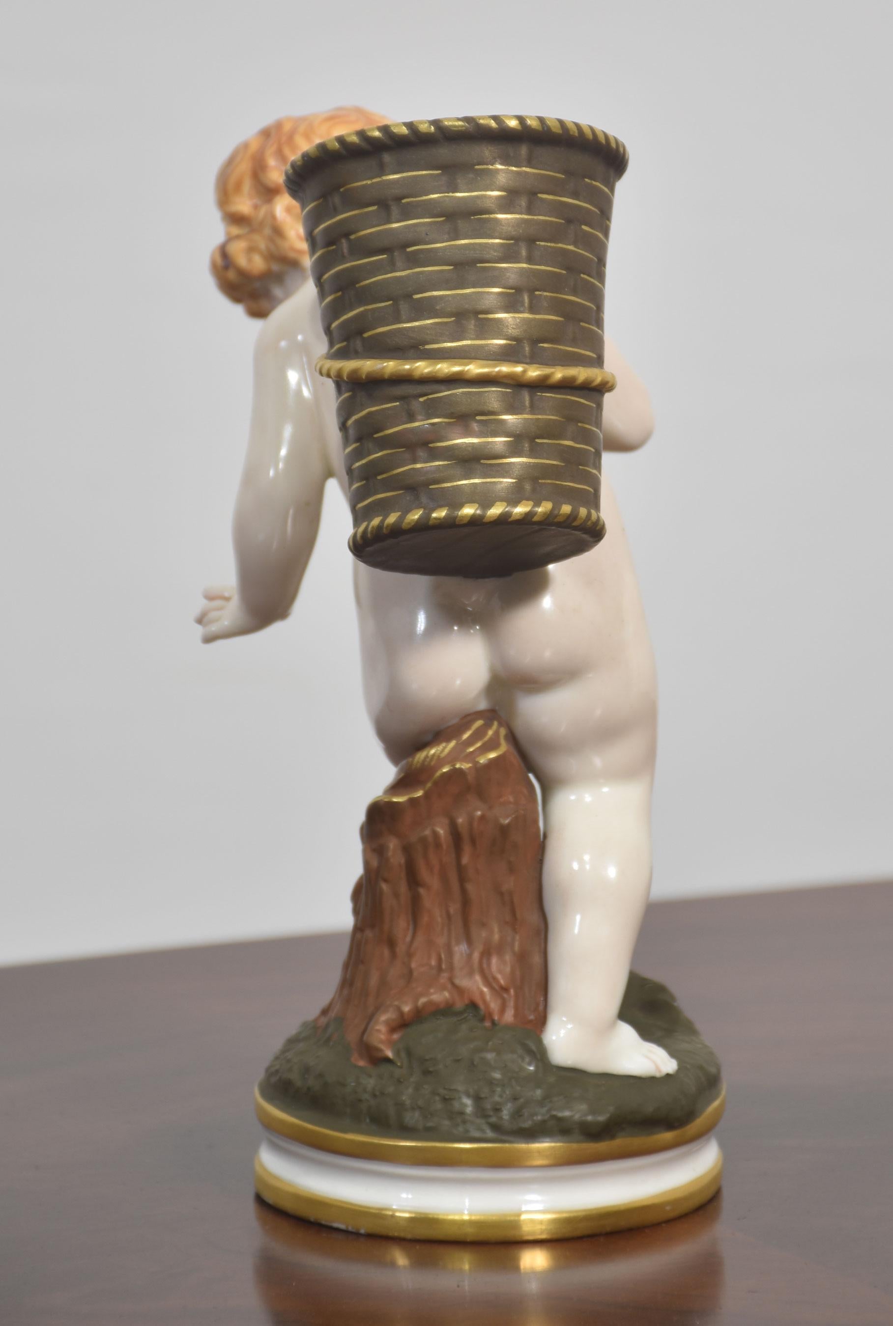 Royal Worcester Porcelain Figure – Cherub with Basket For Sale 1