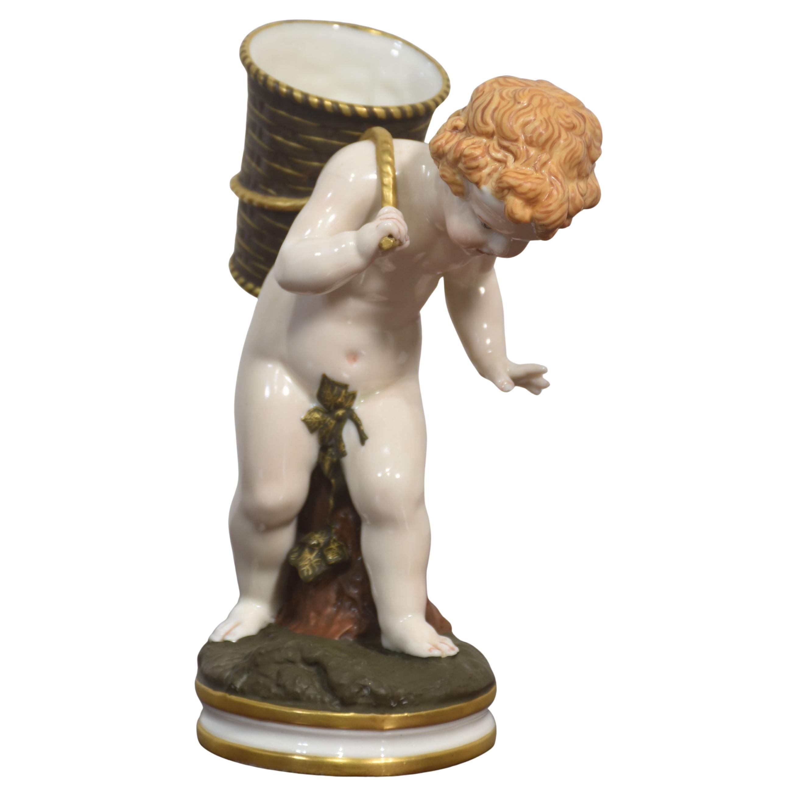 Royal Worcester Porcelain Figure – Cherub with Basket For Sale