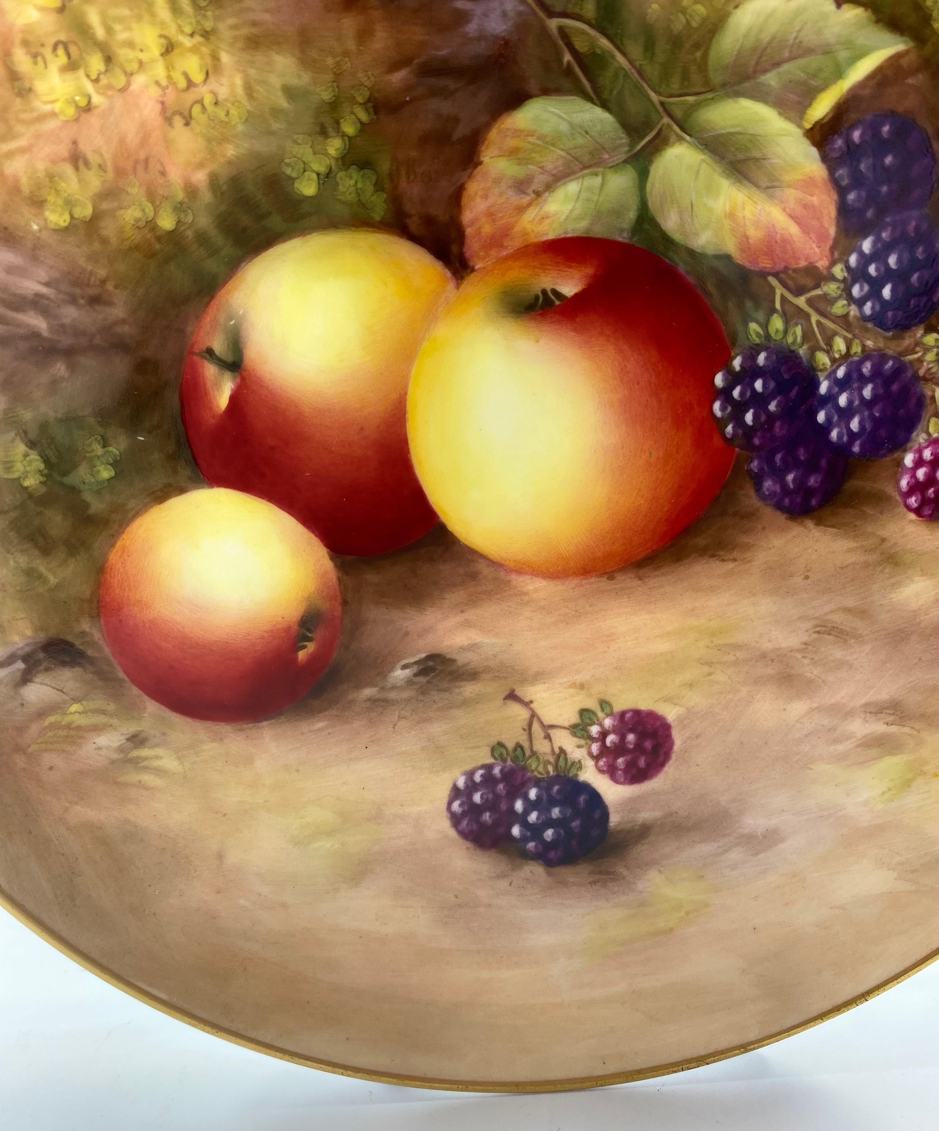 Royal Worcester porcelain plate, dated 1933. The large plate, finely hand painted by Harry Ayrton, with a study of fruit, on a mossy bank.
Signed H. Ayrton.
Printed puce factory marks, and date code for 1933, to the reverse.
Diameter – 23 cm, 9