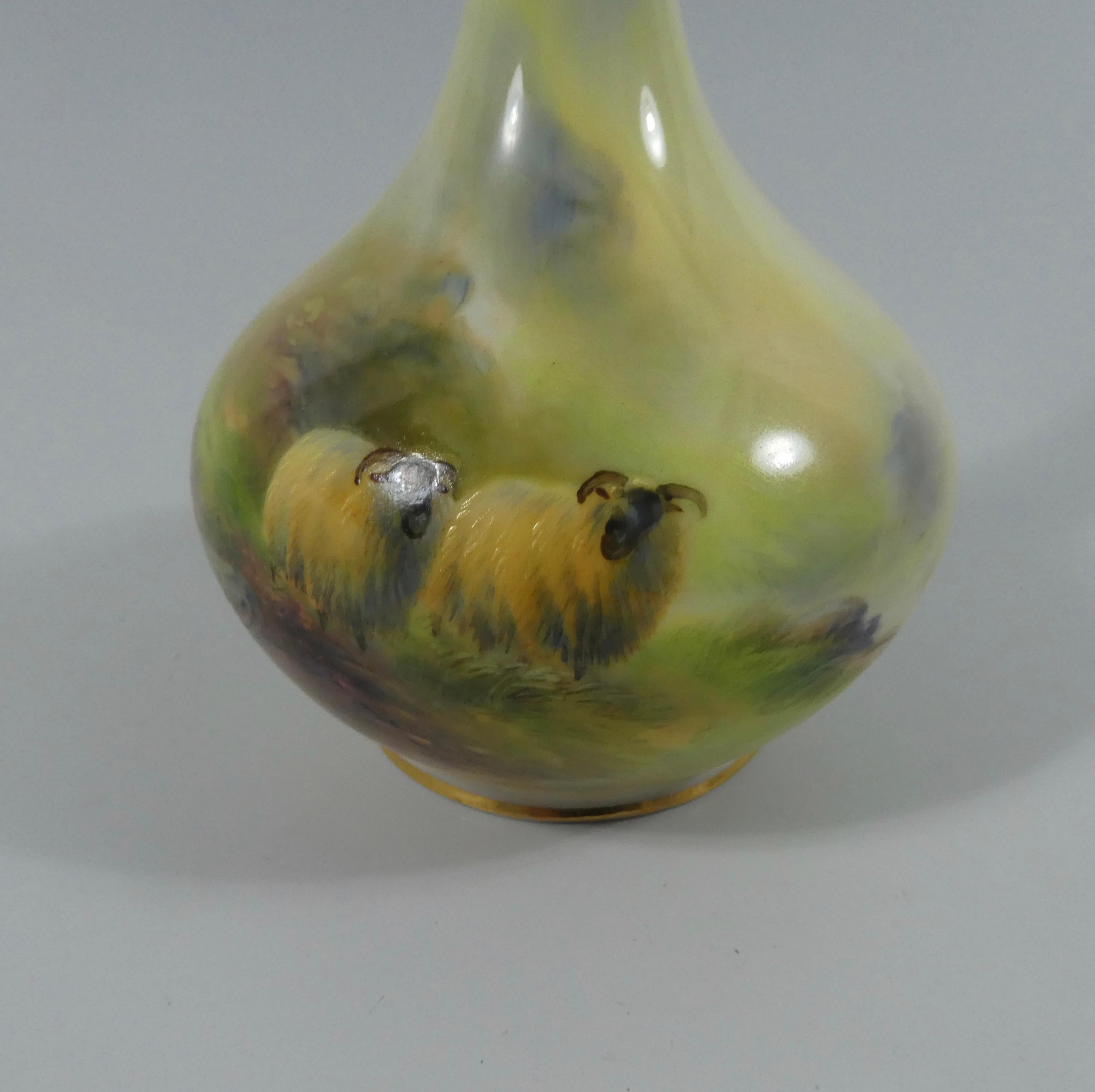 Royal Worcester porcelain vase, dated 1914. Finely painted by Harry Davis, with a scene of sheep before rocks, wandering through a Highland landscape. The neck moulded and gilded, with a stylised leaf motif.
Signed - H. Davis.
Printed puce factory