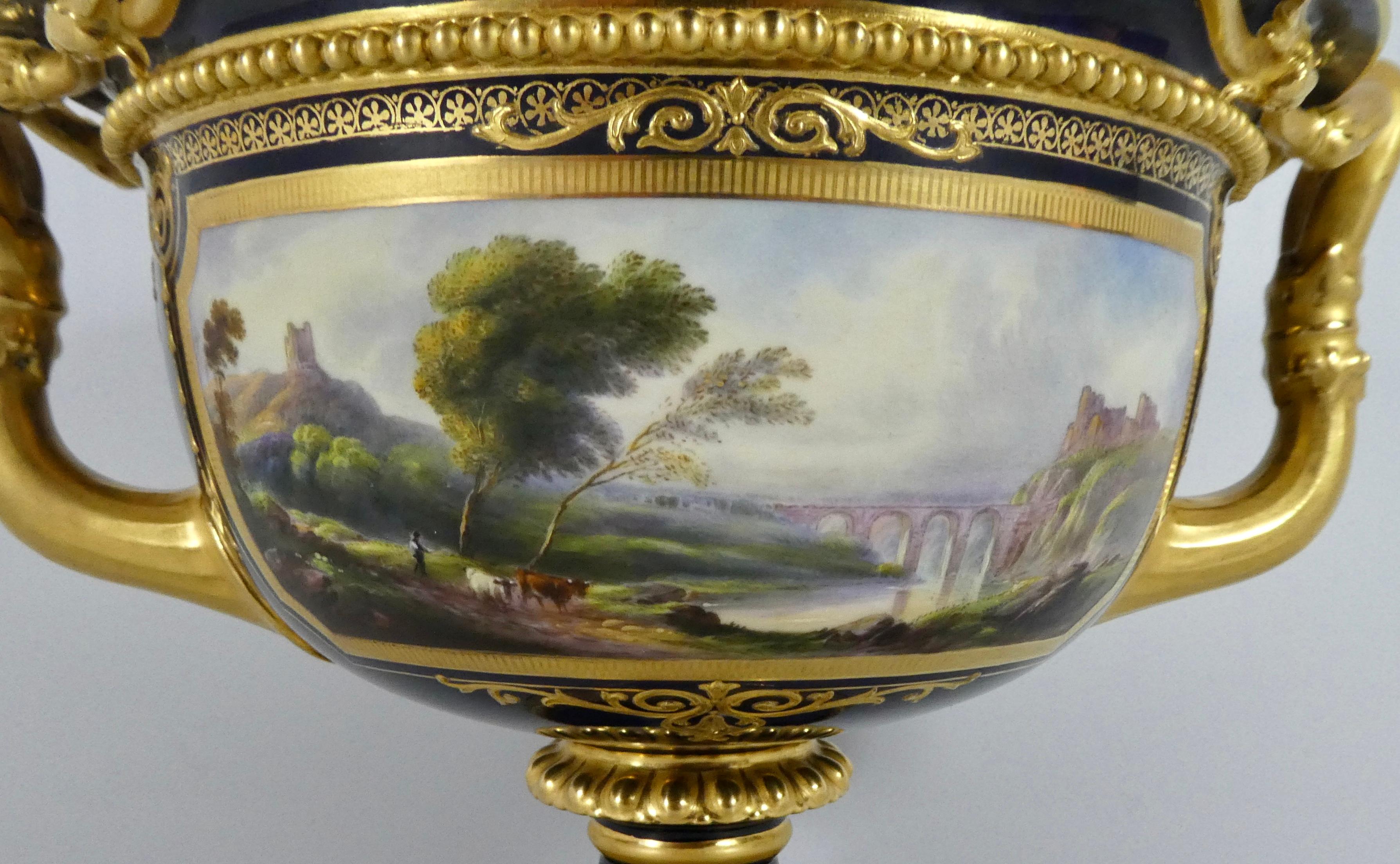 An exceptionally fine Royal Worcester porcelain ‘Warwick Vase’, signed by Harry Davis, dated 1925. This exceptional vase, finely painted with a panoramic, Italianate landscape - a farmer with his cattle, before a river, over which rises a viaduct,