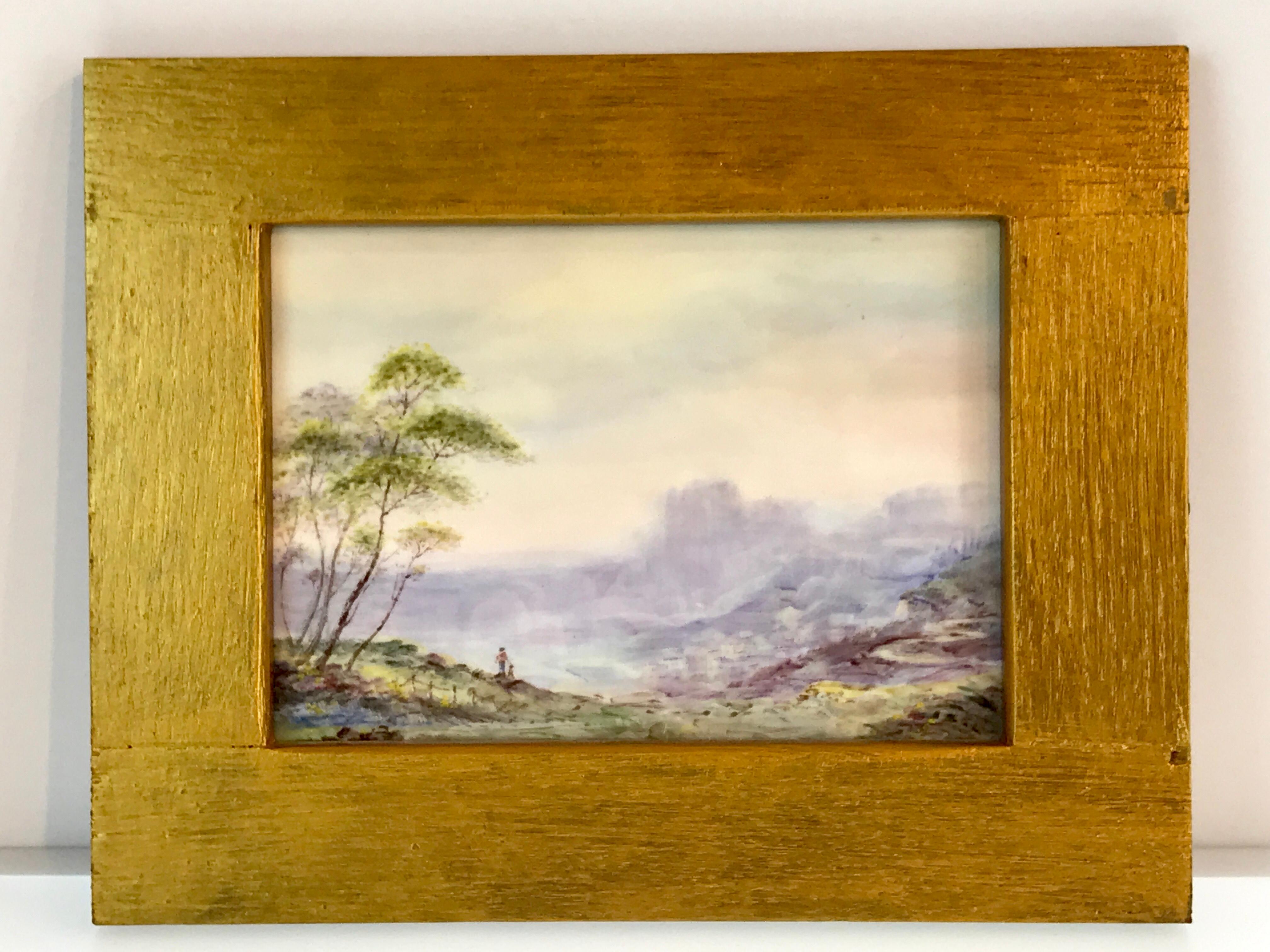 Royal Worcester (attributed) scenic plaque by Richard Lewis. Depicting figures in a landscape with castle, signed R. Lewis lower right, in a later gilt frame. The porcelain plaque measures 7.25