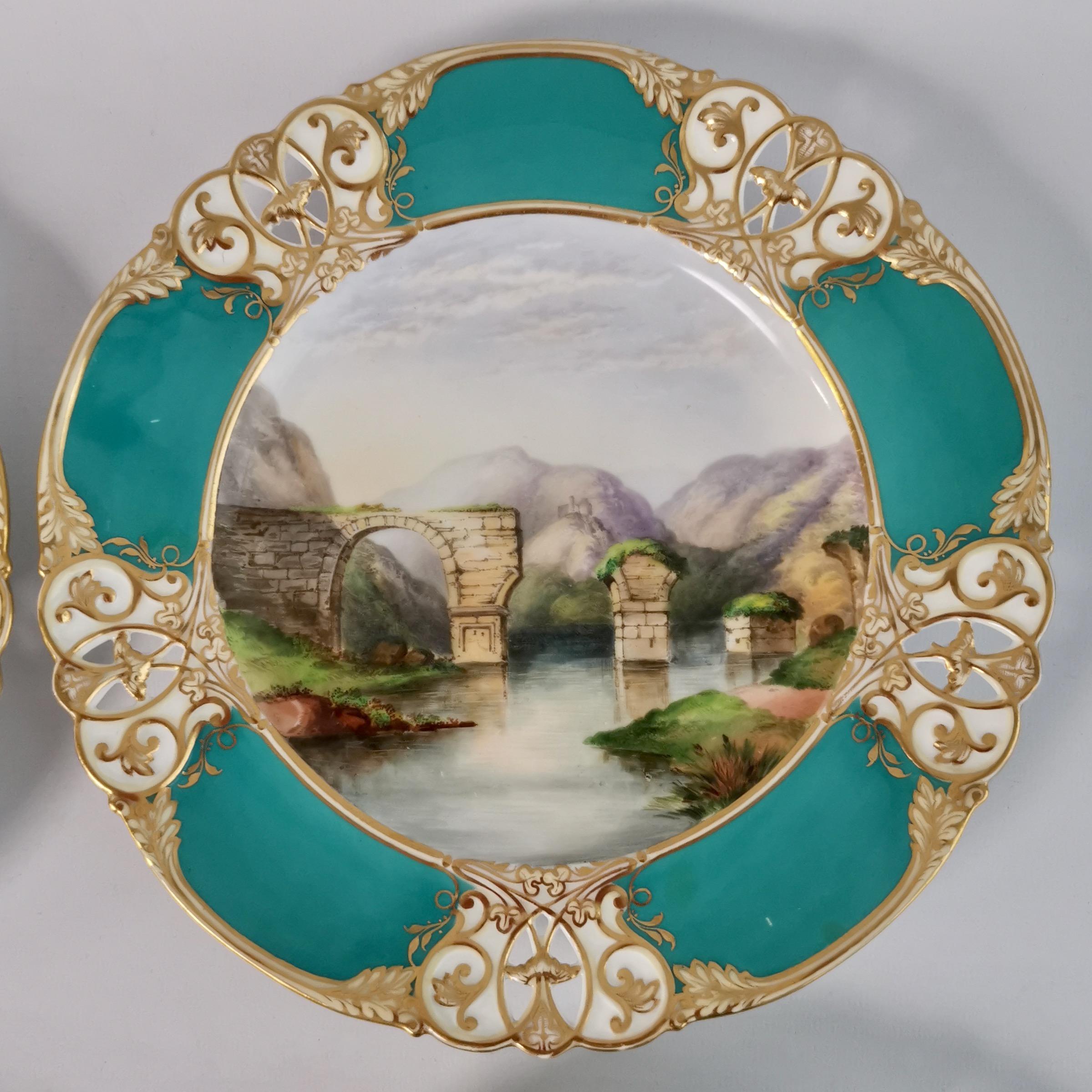 On offer is a beautiful set of four dessert plates made by Royal Worcester around the year 1870. The plates have bright emerald green rims in the 