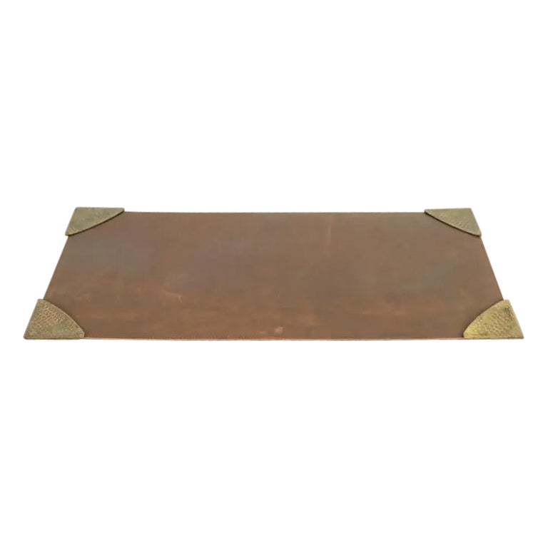How do I clean a leather desk blotter?