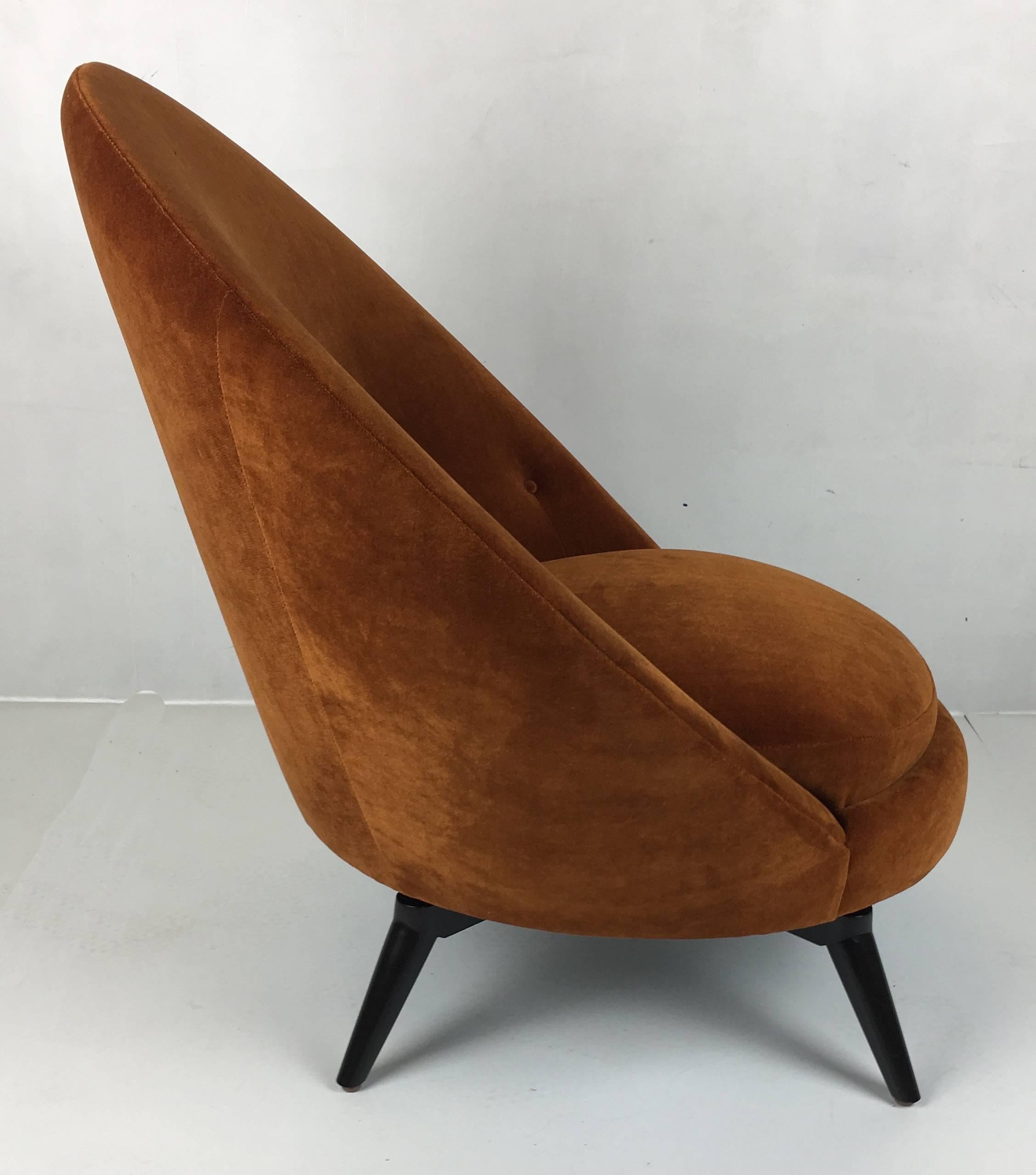 Swivel egg chairs in the style of Jean Royère. This sophisticated chair has been freshly upholstered in heavy-weight, backed burnt gold velvet but we also offer them in COM. These super stylish and versatile chairs are as comfortable as they look