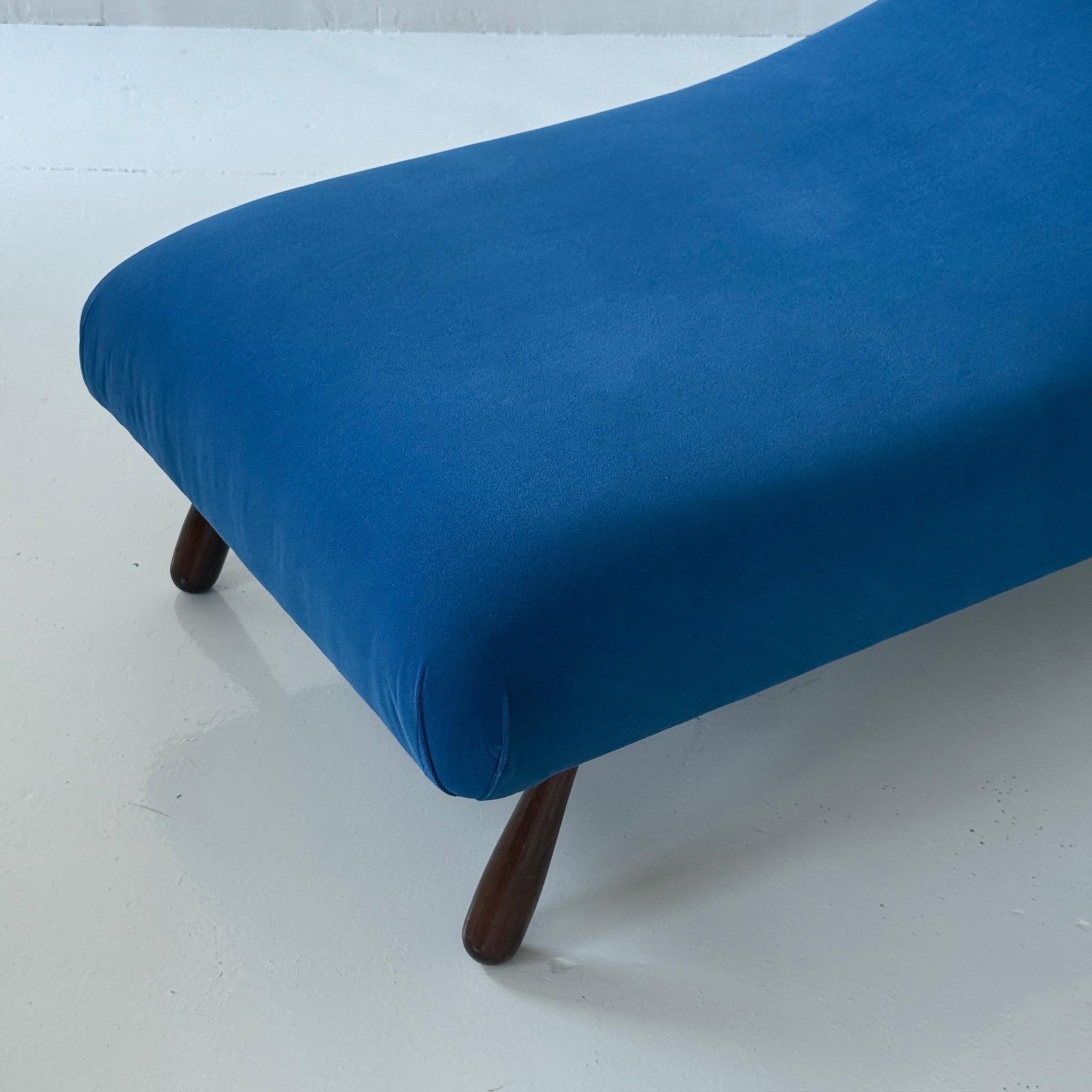 c. 1970s. France. Wood club legs with fully upholstered frame. Reupholstered in blue velvet

