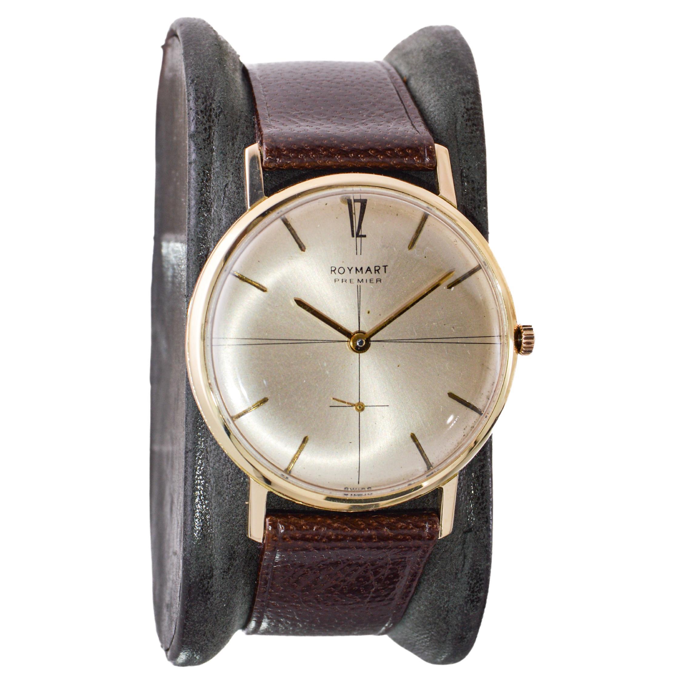 FACTORY / HOUSE: Alstater for Roymart Jewelers 
STYLE / REFERENCE: Dress Style / Round 
METAL / MATERIAL: 14Kt Solid Gold 
CIRCA / YEAR: 1950 / 60's
DIMENSIONS / SIZE: Length 40mm X Diameter 34mm
MOVEMENT / CALIBER: Manual Winding / 17 Jewels /