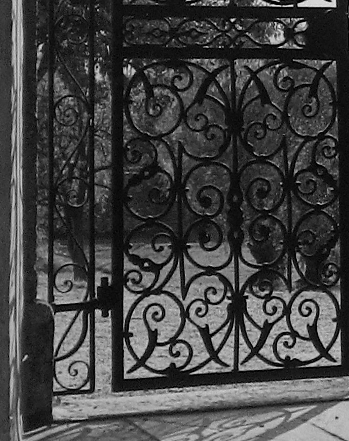 This 1960s romantic black and white silver gelatin print of a Roman gate and Italian grove with a chateau is by New York/San Francisco photographer Roz Joseph (1926-2019). Joseph traveled extensively in the 1960s shooting in black and white and