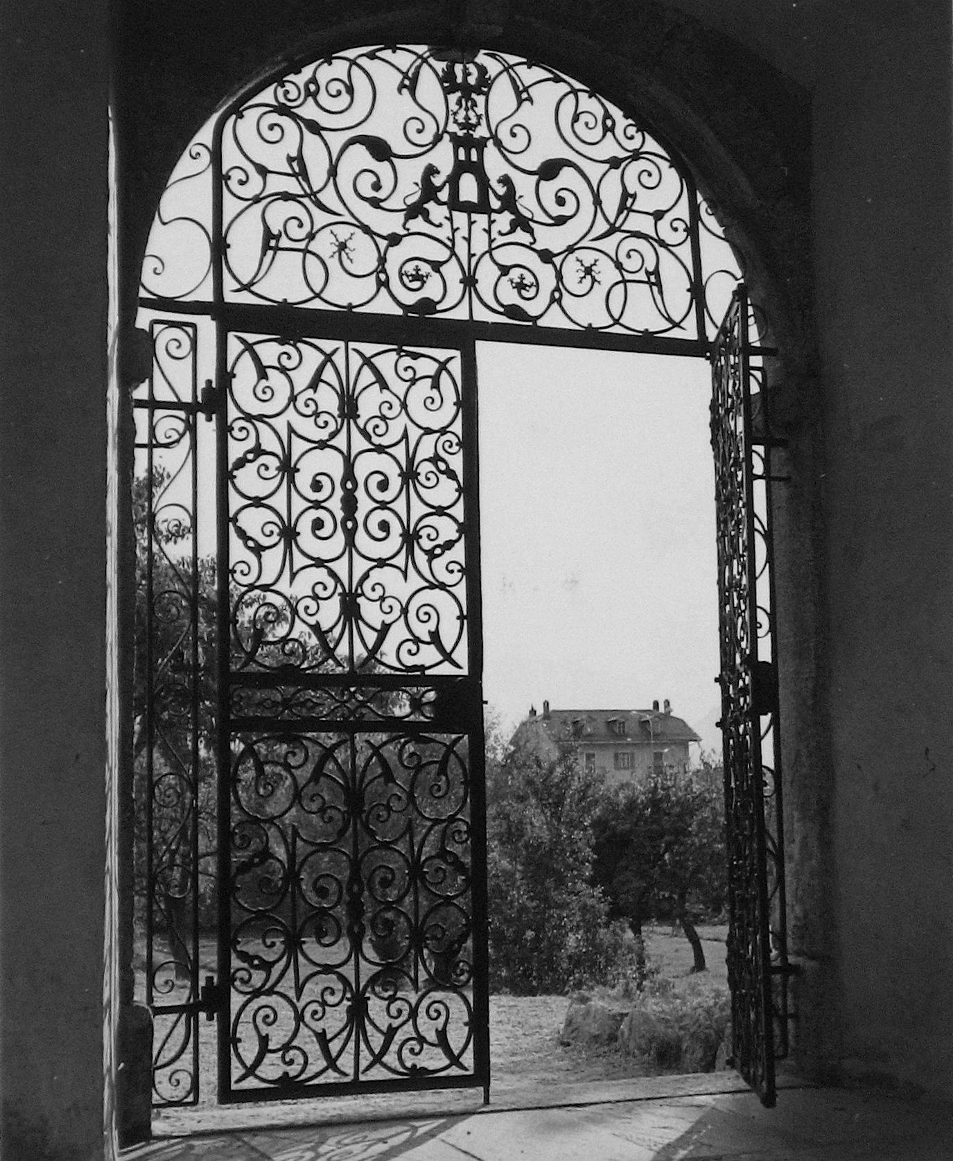 Roz Joseph Landscape Photograph - 1960s Black and White Photograph of Roman Gate and Italian Grove with Chateau