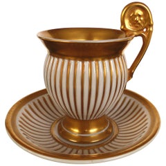 R.P.M. Germany Porcelain Gilt Decorated Demitasse Cup and Saucer