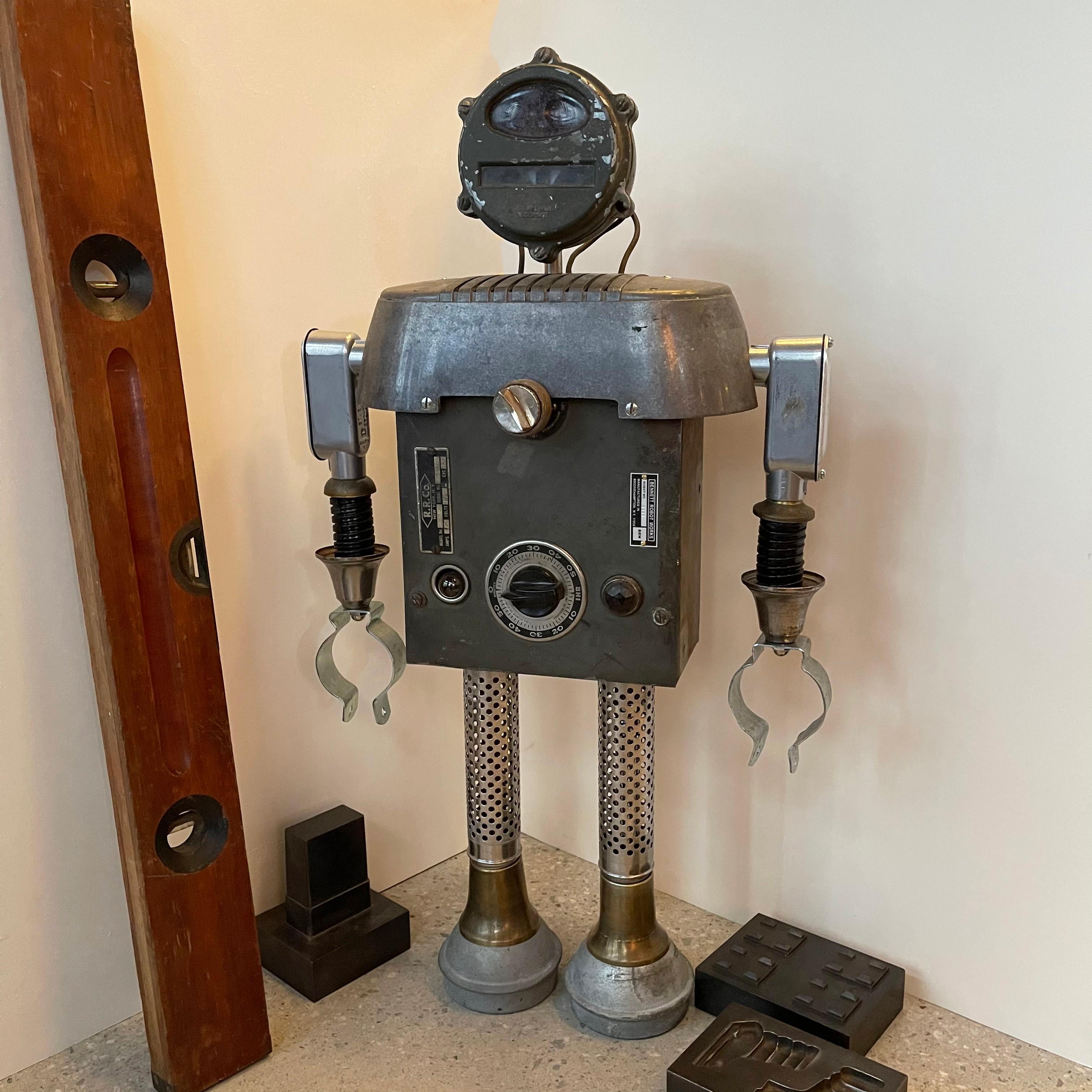 Custom robot sculpture named Markel by Bennett Robot Works, Brooklyn, NY

Bennett Robot Works, robot sculptures created by Gordon Bennett, are composed of found, vintage objects used in their unaltered entirety. They are inspired by Norman Bel