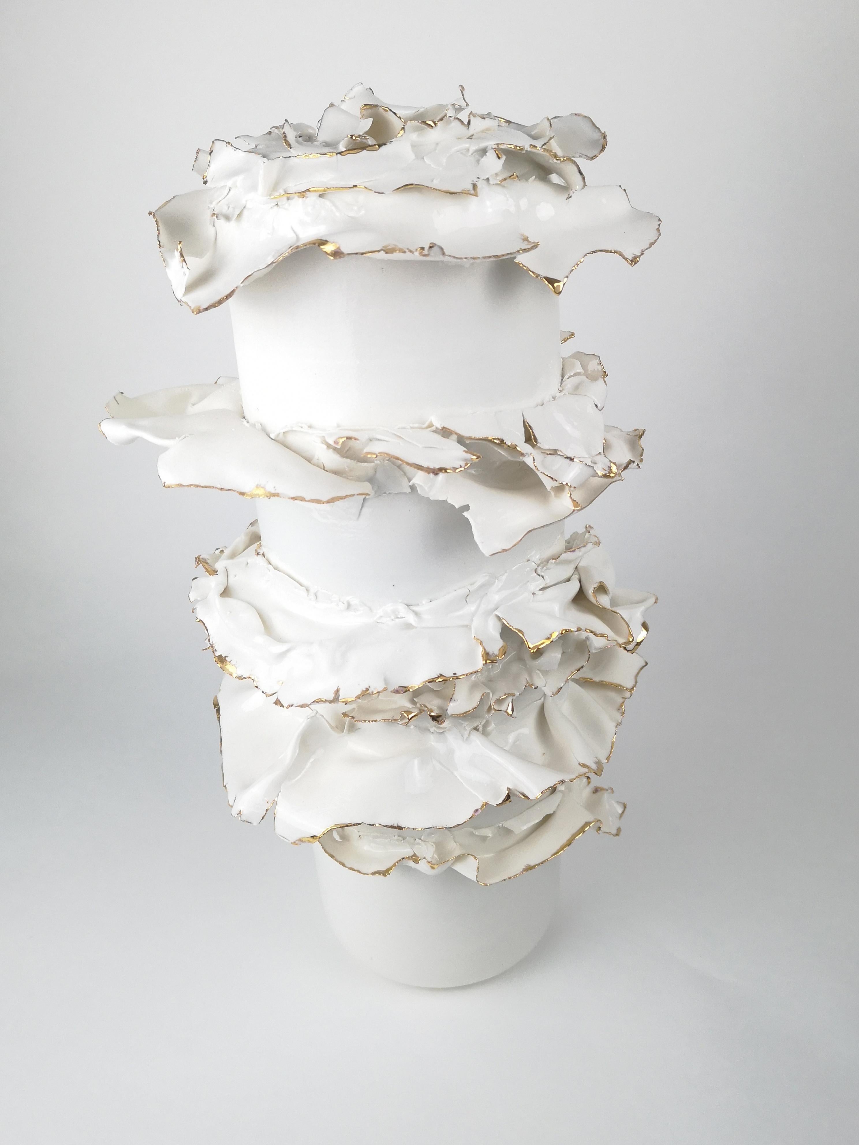 Rrippeled Beauty Sculpture by Dora Stanczel
One of a Kind.
Dimensions: D 20 x W 20 x H 32 cm.
Materials: Porcelain and gold.

I create bespoke and luxurious porcelain pieces with a careful aesthetic. Beyond the technical mastery of casting, what