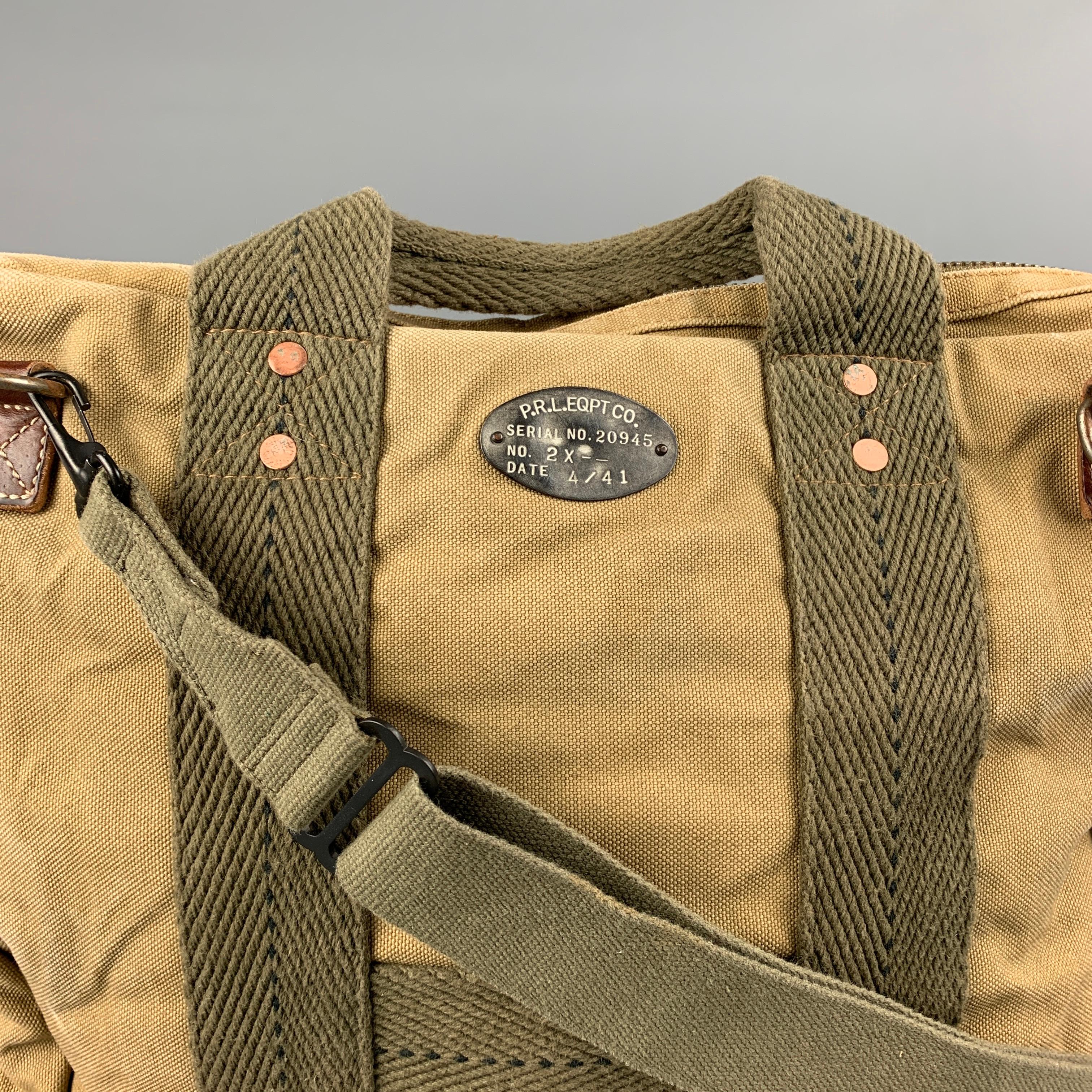 RRL by RALPH LAUREN Limited Edition Utility Equipment cross body bag comes in a khaki & olive canvas featuring a 
