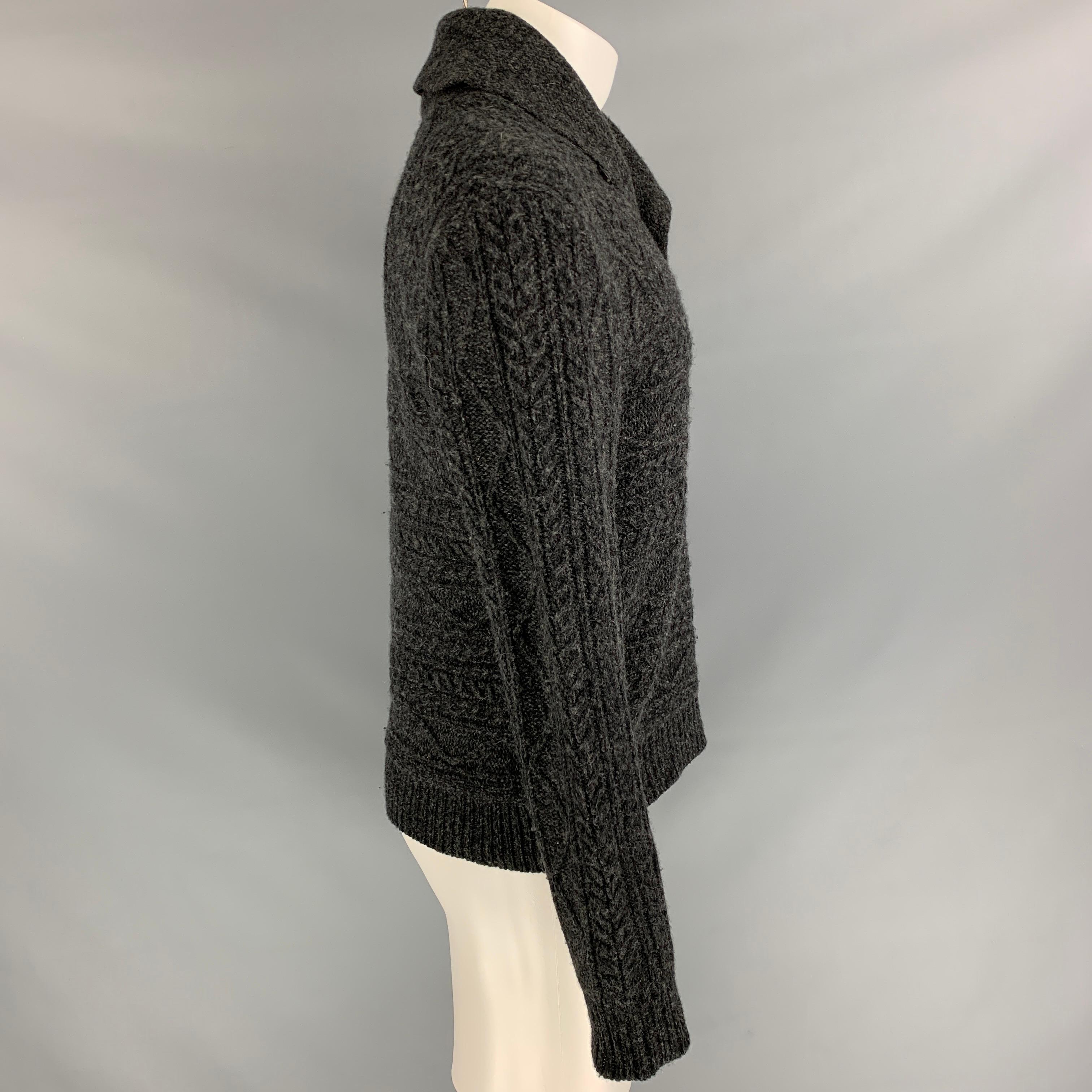 RRL by RALPH LAUREN sweater comes in a charcoal knitted wool featuring a shawl collar and long sleeves. 

Very Good Pre-Owned Condition.
Marked: M

Measurements:

Shoulder: 20 in.
Chest: 40 in.
Sleeve: 26 in.
Length: 25 in. 