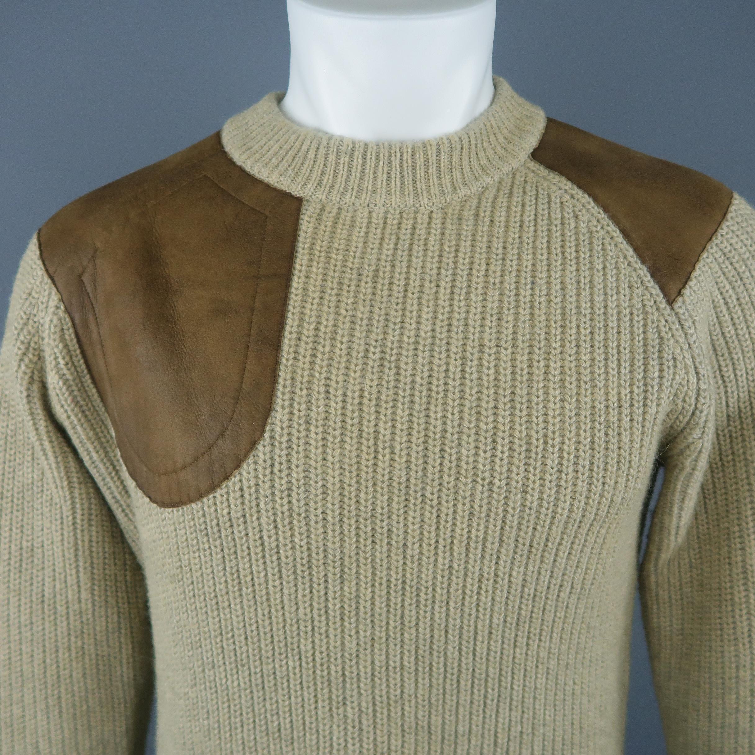 RALPH LAUREN RRL pullover sweater comes in beige cotton blend knit with brown leather patches and a ribbed crewneck and cuffs.
 
Excellent Pre-Owned Condition.
Marked: M
 
Measurements:
 
Shoulder: 18.5 in.
Chest: 44 in.
Sleeve: 28 in.
Length: 27 in.