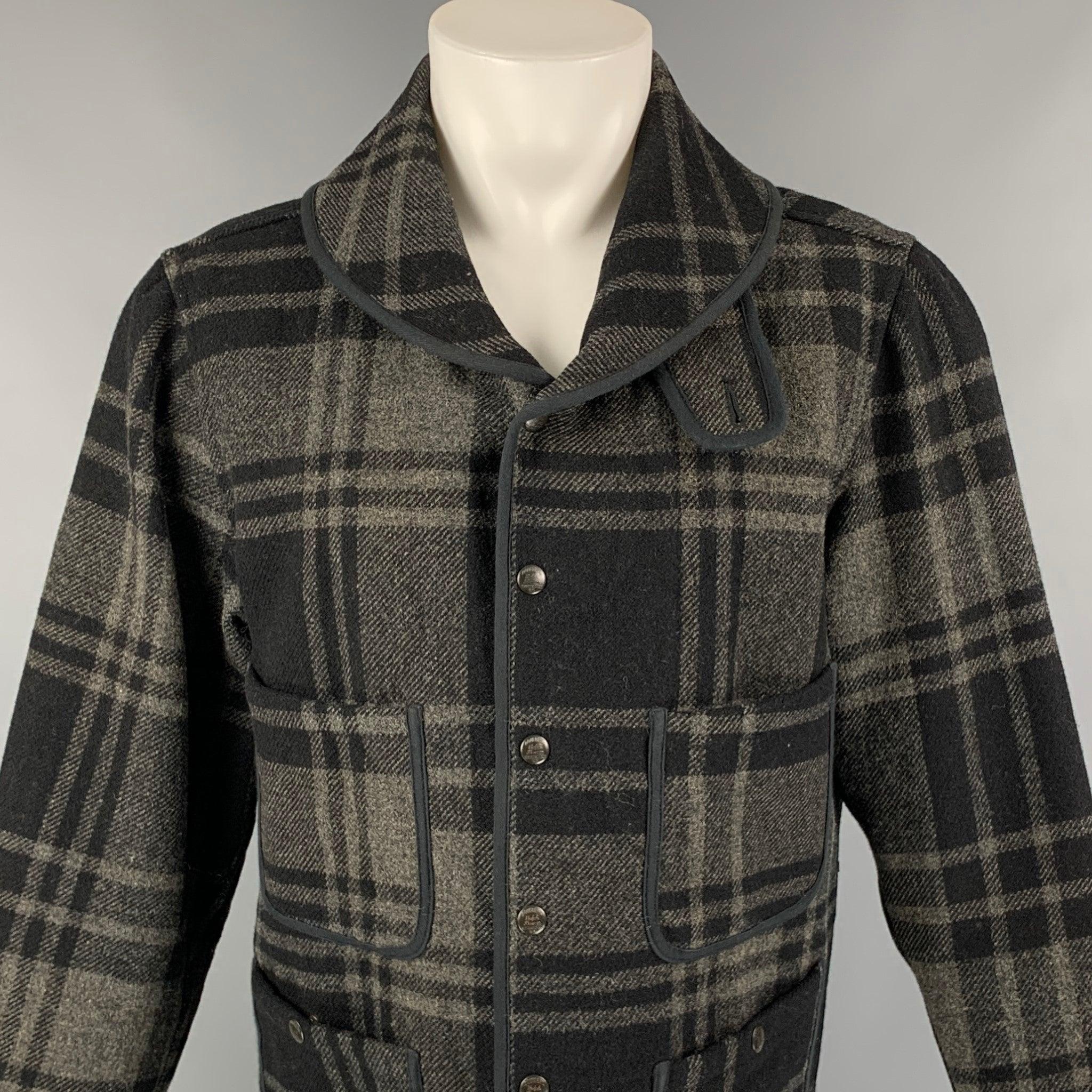 RRL by RALPH LAUREN jacket comes in a black & grey wool featuring a shawl collar, back belt, patch pockets, and a snap button closure.
Very Good
Pre-Owned Condition. 

Marked:   M 

Measurements: 
 
Shoulder: 18 inches  Chest: 40 inches  Sleeve: 26