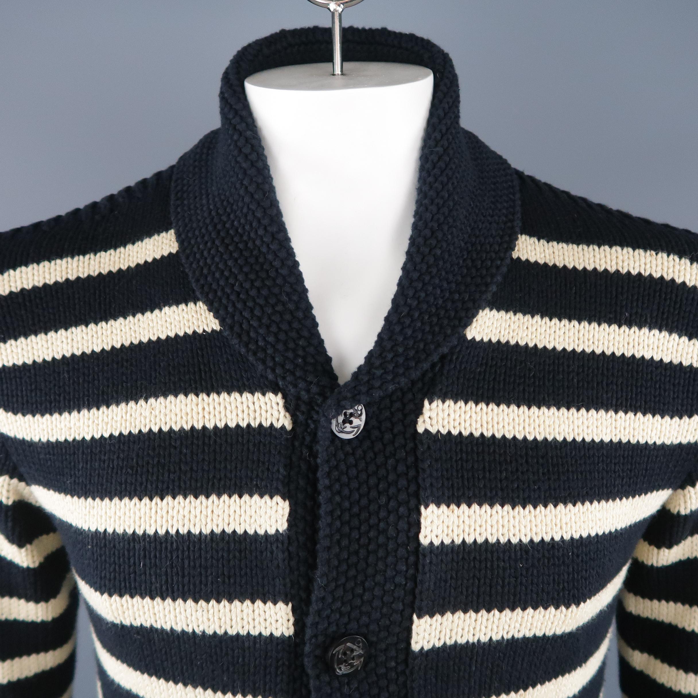 RRL by RALPH LAUREN Cardigan Sweater comes in navy and cream tones  in a striped cotton / wool hand knit material, with a shawl collar, 5 buttons at closure, patch  pockets and ribbed cuffs and hem.
 
Excellent Pre-Owned Condition.
Marked: M
