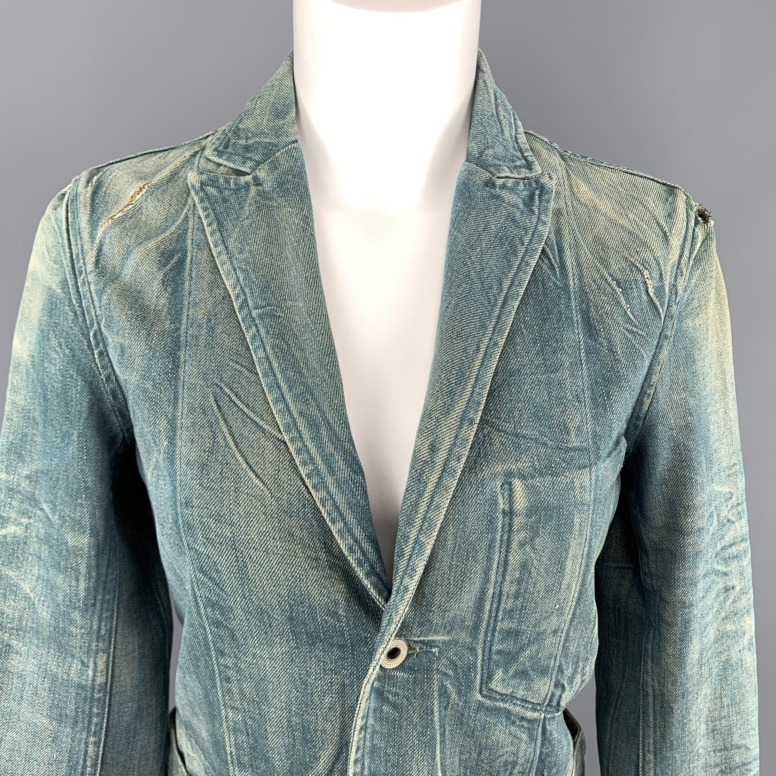RRL work style jacket comes in dirty washed denim with distressing throughout,patch pockets, and cropped sleeves.
 
Excellent Pre-Owned Condition.
Marked: S
 
Measurements:
 
Shoulder: 16 in.
Bust: 34 in.
Sleeve: 18 in.
Length: 25.5 in.
