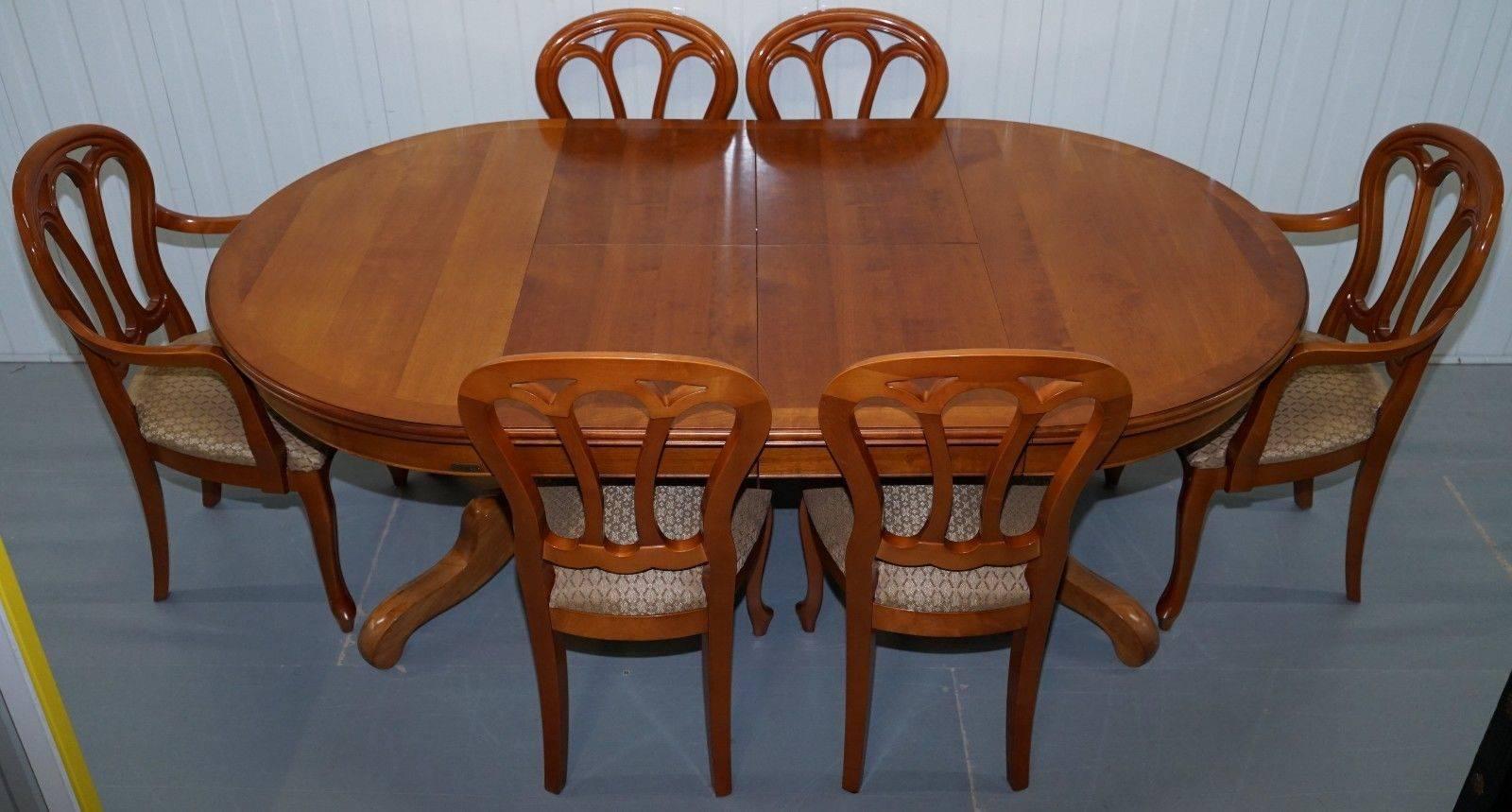 We are delighted to offer for sale this stunning handmade in France RRP £6000 Grange cherrywood extending dining table and six chairs

A very good looking and well-made piece, the table seats four completely folded, six with one leaf open, six