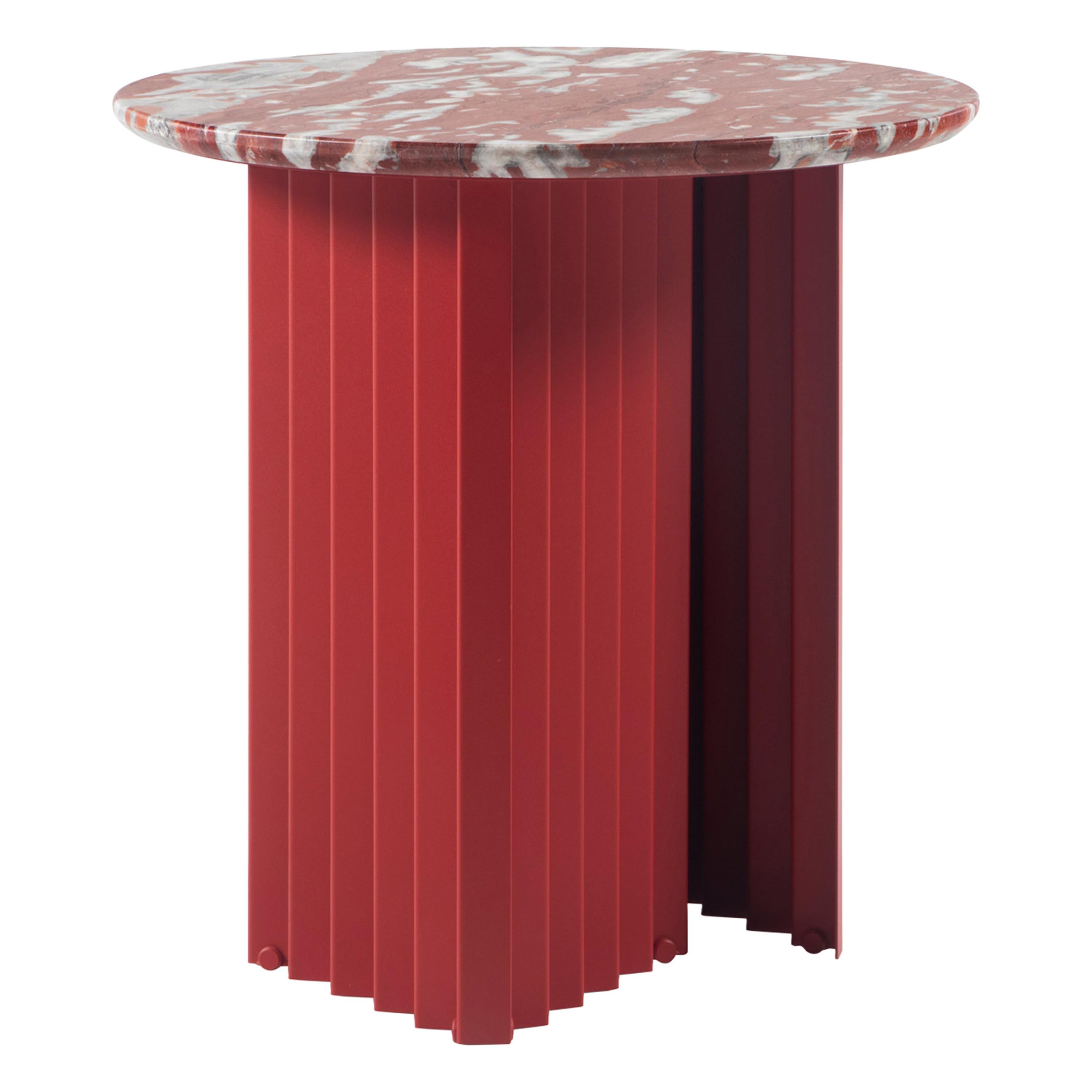 Plec is a collection of coffee and side tables that are as happy together as they are alone. With their accordion-shaped legs, these Plec round tables love creating light and shade effects at any time of day. The Plec table has a steel structure
