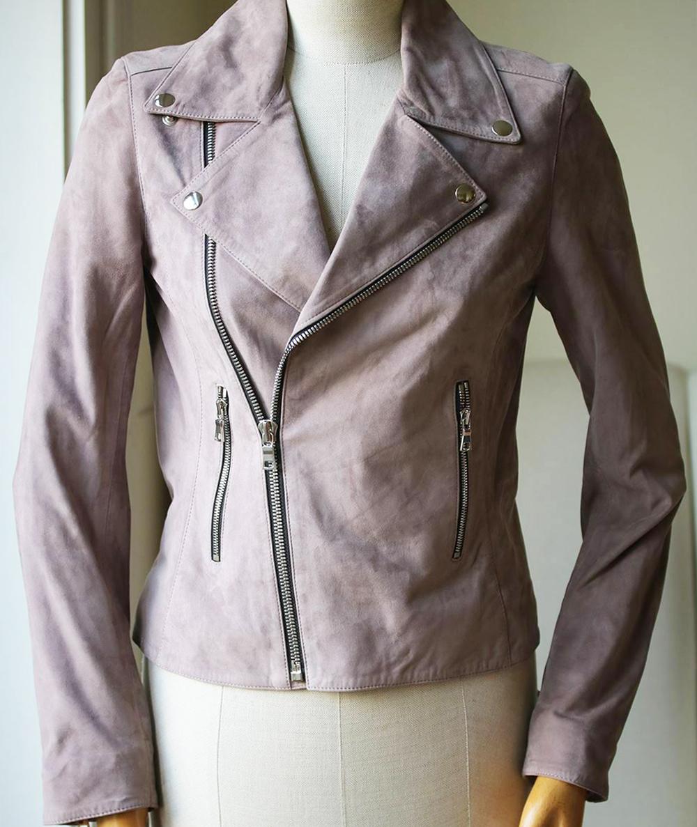 RtA's Nico Moto Jacket is the topper you'll never want to take off. With its uniquely smoky neutral hue and timeless cut, this essential suede jacket layers flawlessly over any ensemble for a lifetime of elevated looks. Front asymmetrical zipper